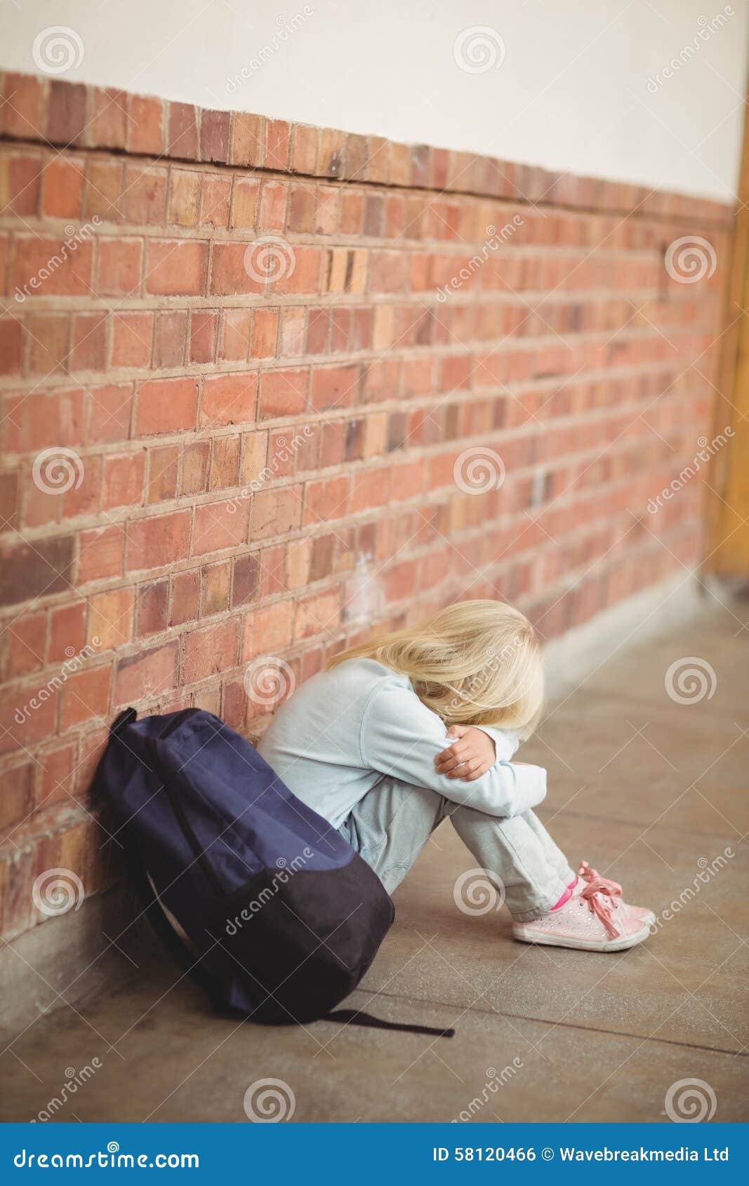 Sad Pupil Sitting Alone on Ground Stock Photo - Image of crying ...