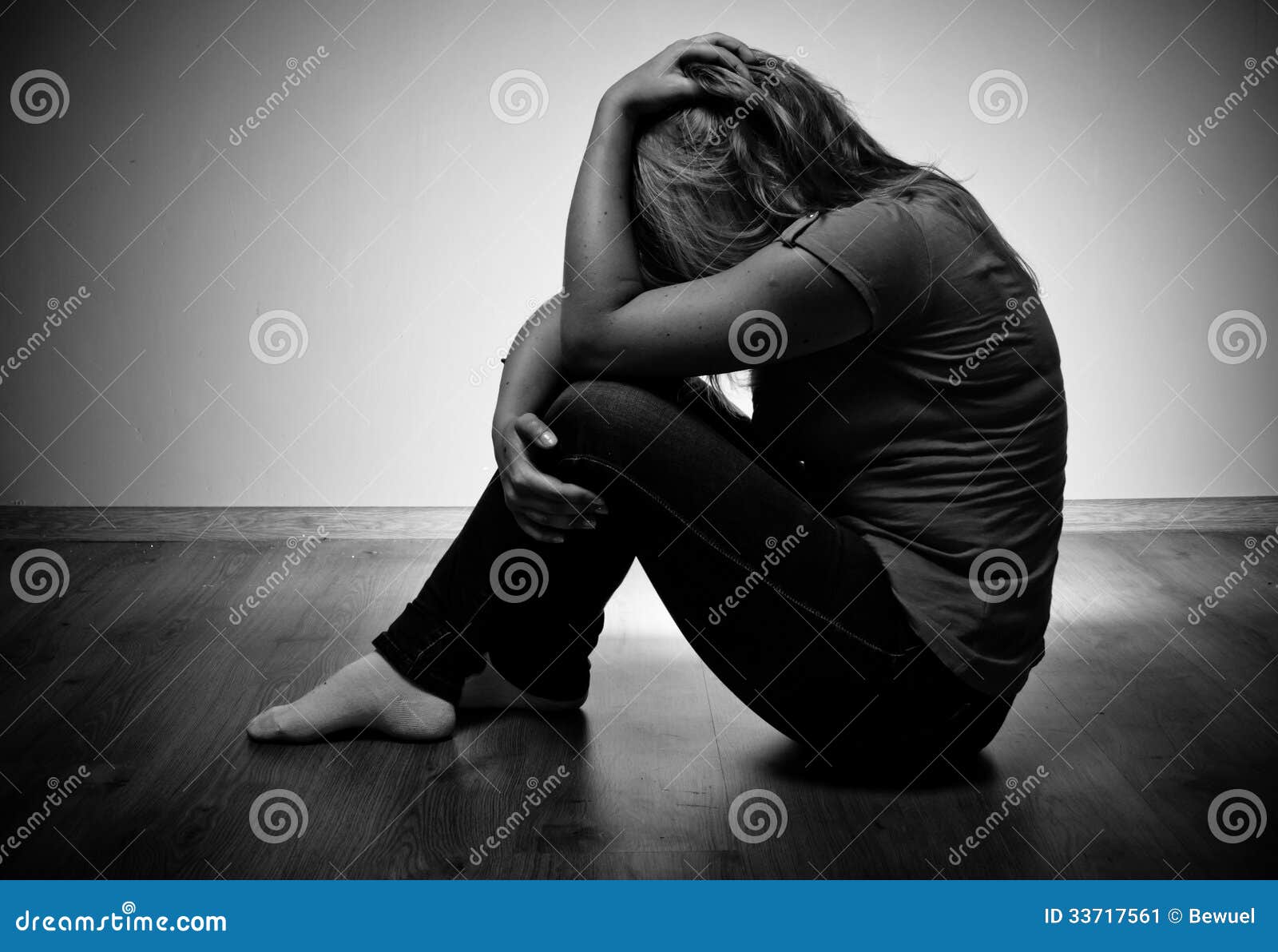 Sad woman sitting alone stock image. Image of beautiful - 33717561