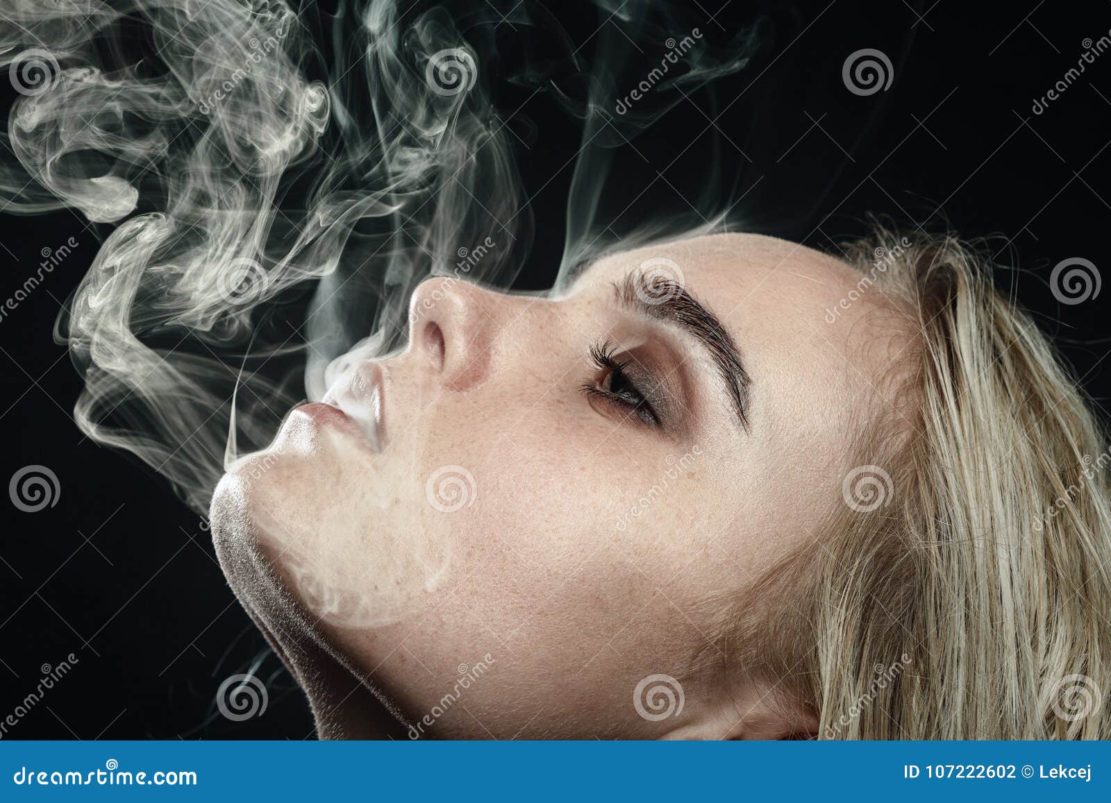 Blond girl smoking stock photo. Image of people, eyes - 107222602