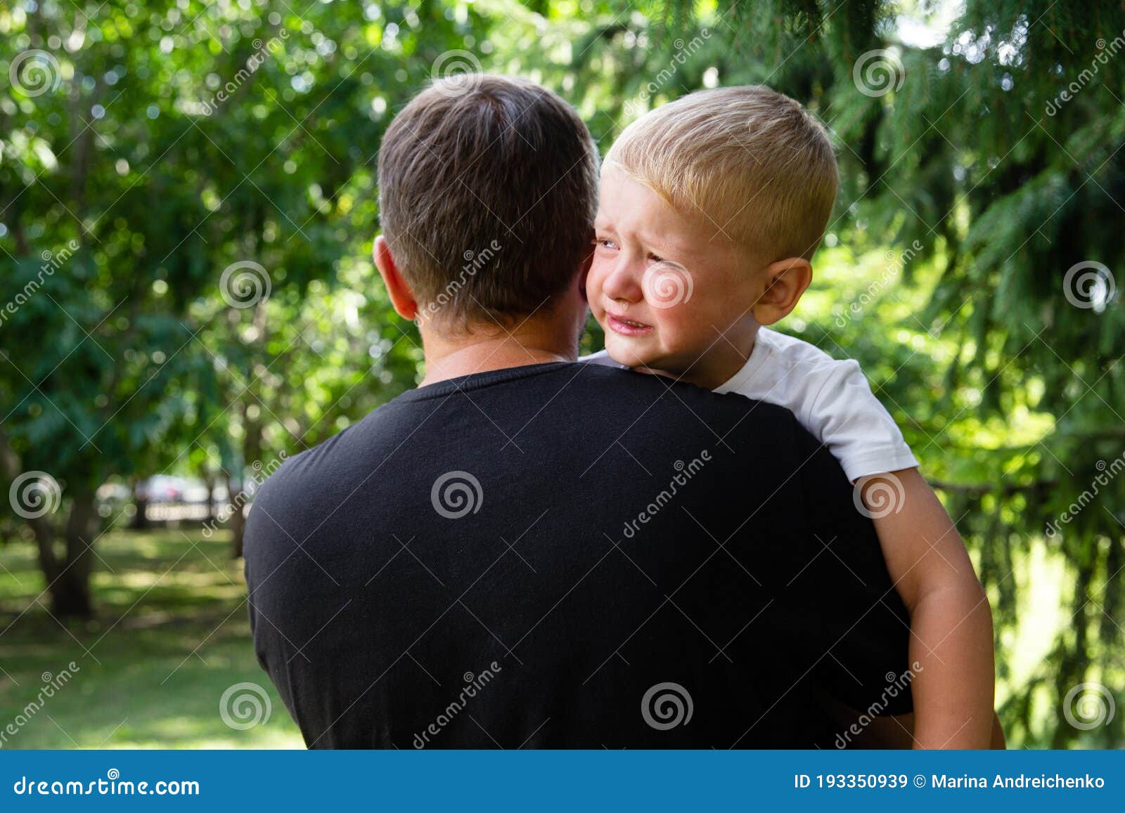 Sad Young Boy Crying on Fathers Hands in Nature, Park, Outdoor ...