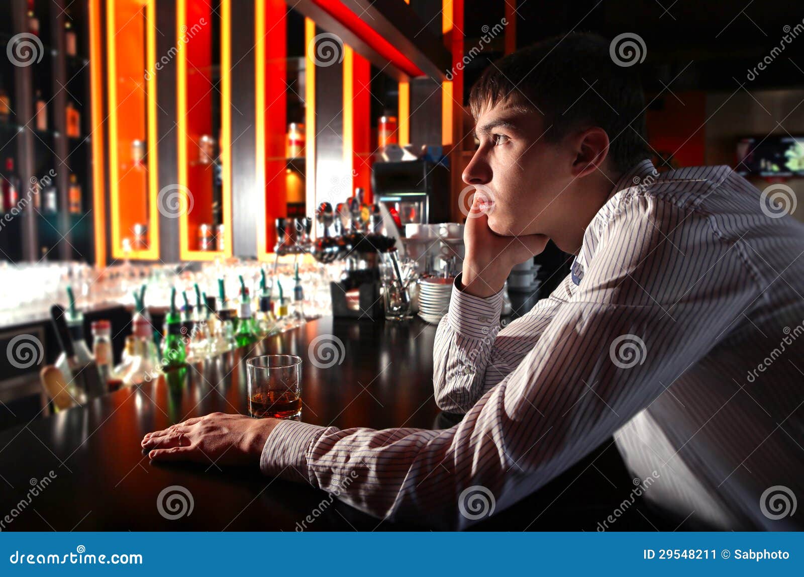 Sad Young Man At The Bar Stock Image - Image: 29548211