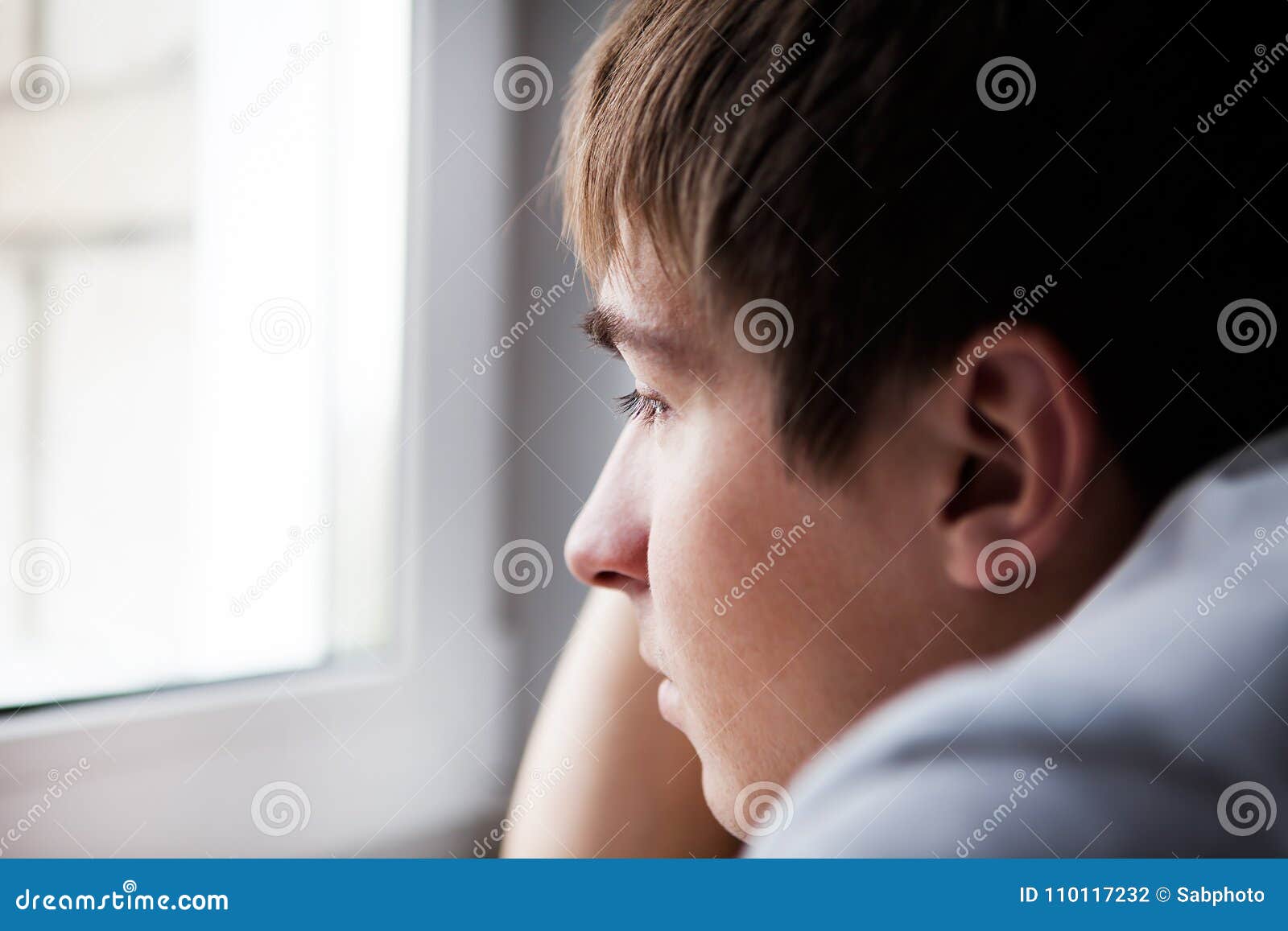 Sad Young Man stock photo. Image of distress, room, heartbroken - 110117232