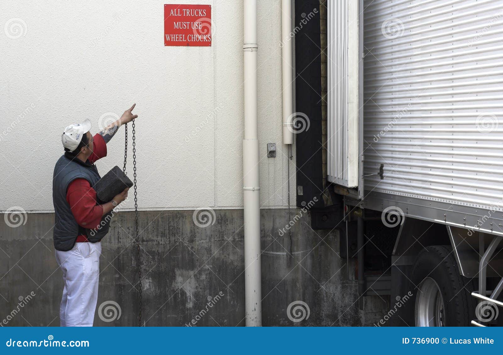 Safety Chocks stock photo. Image of clothing, chock, bluecollar 736900