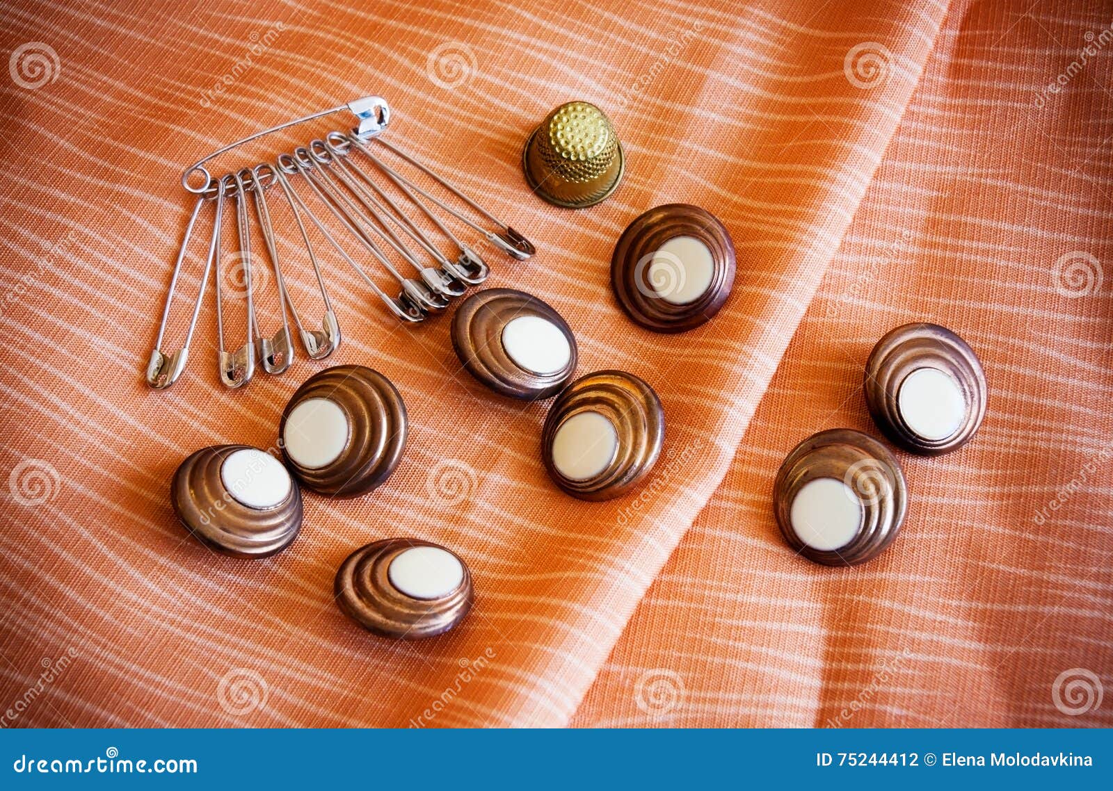 Safety pins and buttons stock photo. Image of attach 75244412
