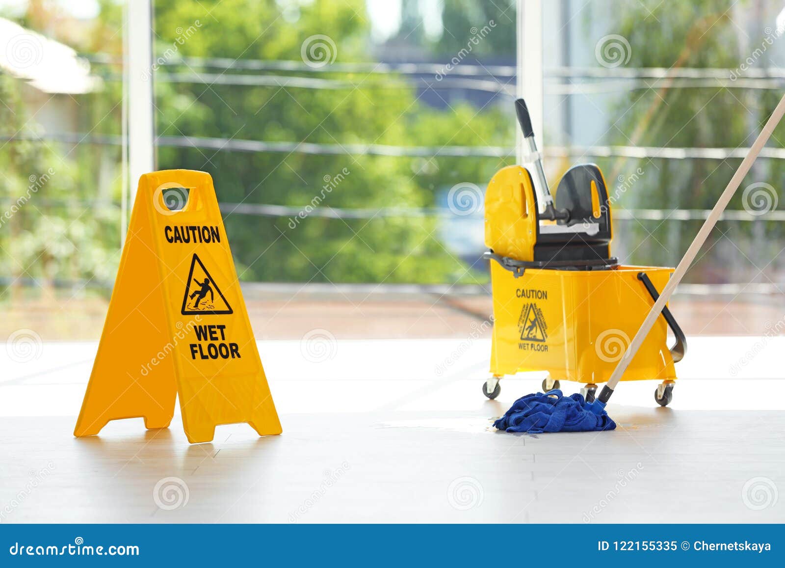 https://thumbs.dreamstime.com/z/safety-sign-phrase-caution-wet-floor-safety-sign-phrase-caution-wet-floor-mop-bucket-indoors-cleaning-service-122155335.jpg