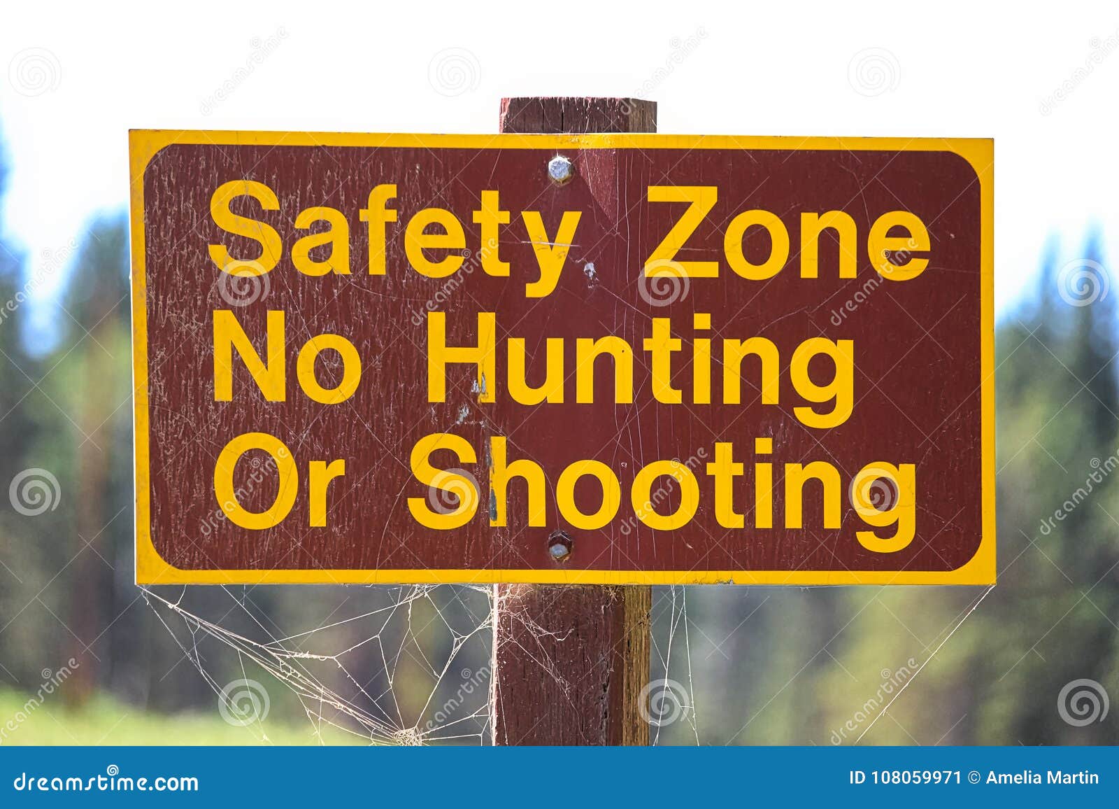 A Safety Zone, No Hunting or Shooting Sign Stock Image Image of