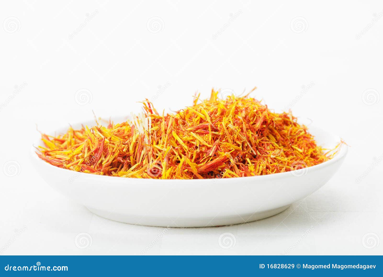 Saffron Leaves Spice in White Dish Stock Image Image of tablecloth