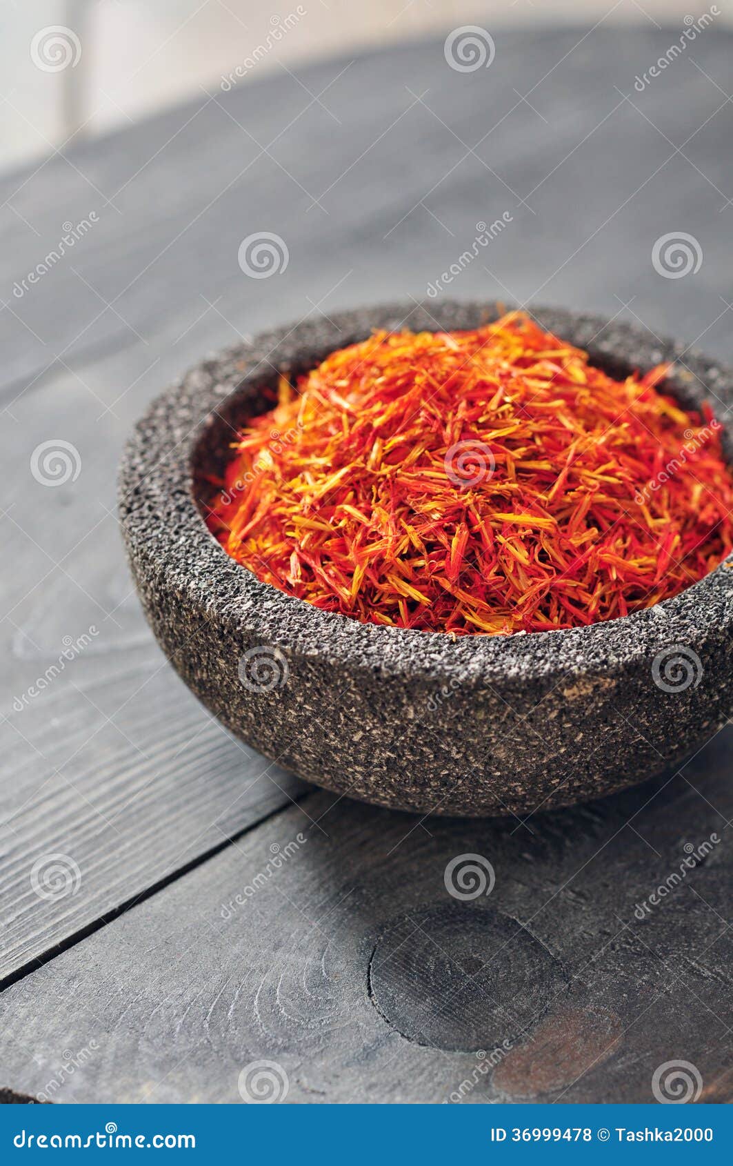 Saffron in stone bowl stock photo. Image of moroccan 36999478