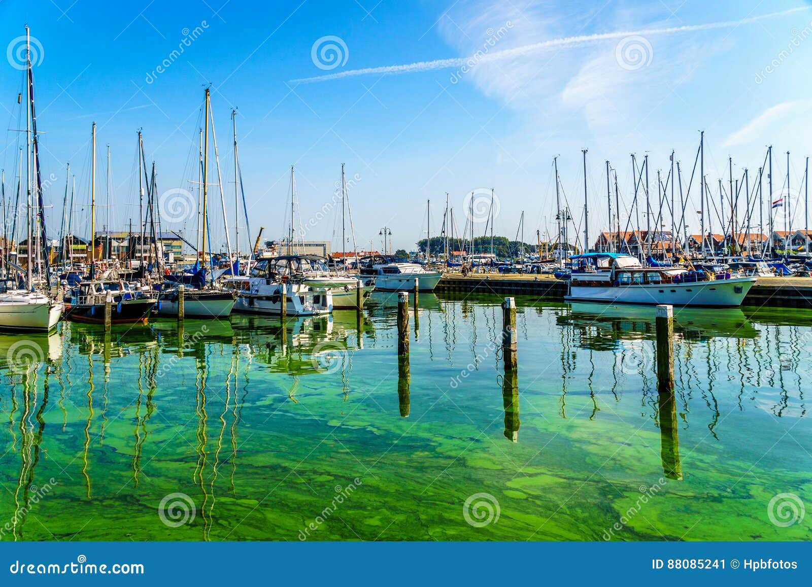 Sail Boats And Motor Boats Moored In A Part Of The Harbor ...
