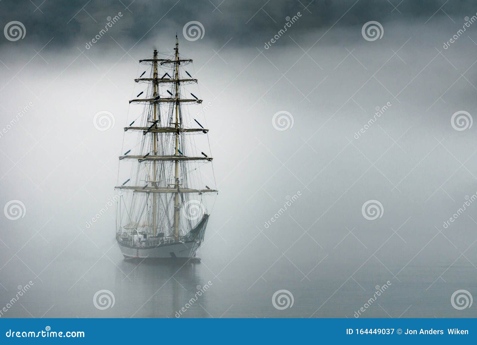 sailboat and foggy weather