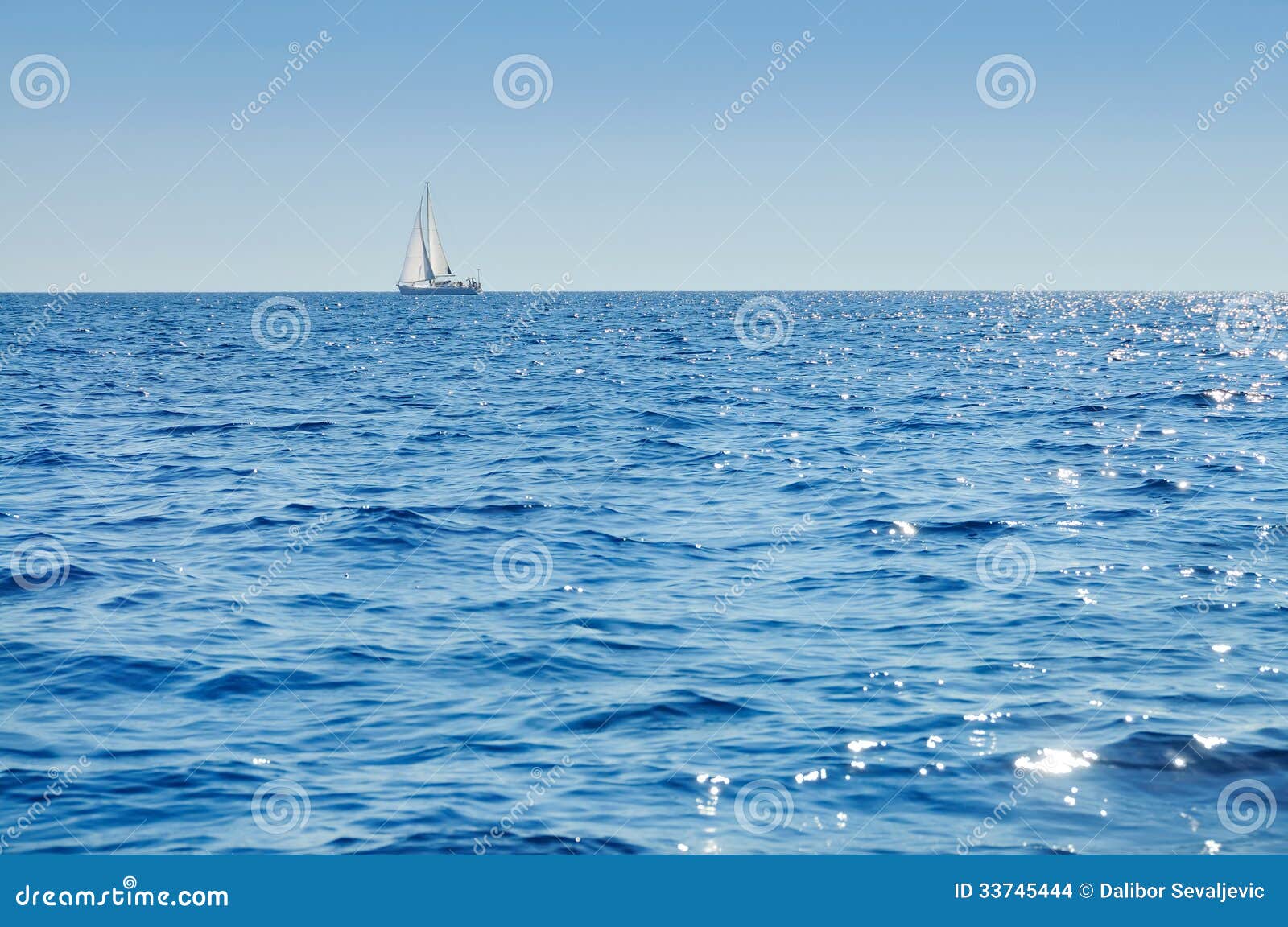 sailboat at horizon