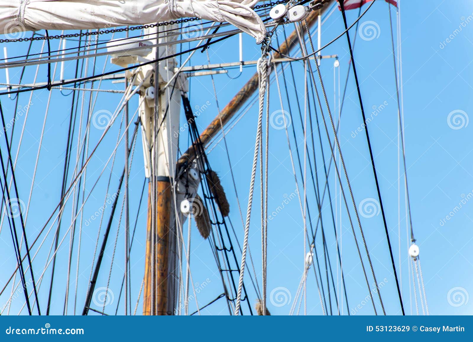 Sailboat Masts, Rigging and Rolled Up Sails Stock Image Image of