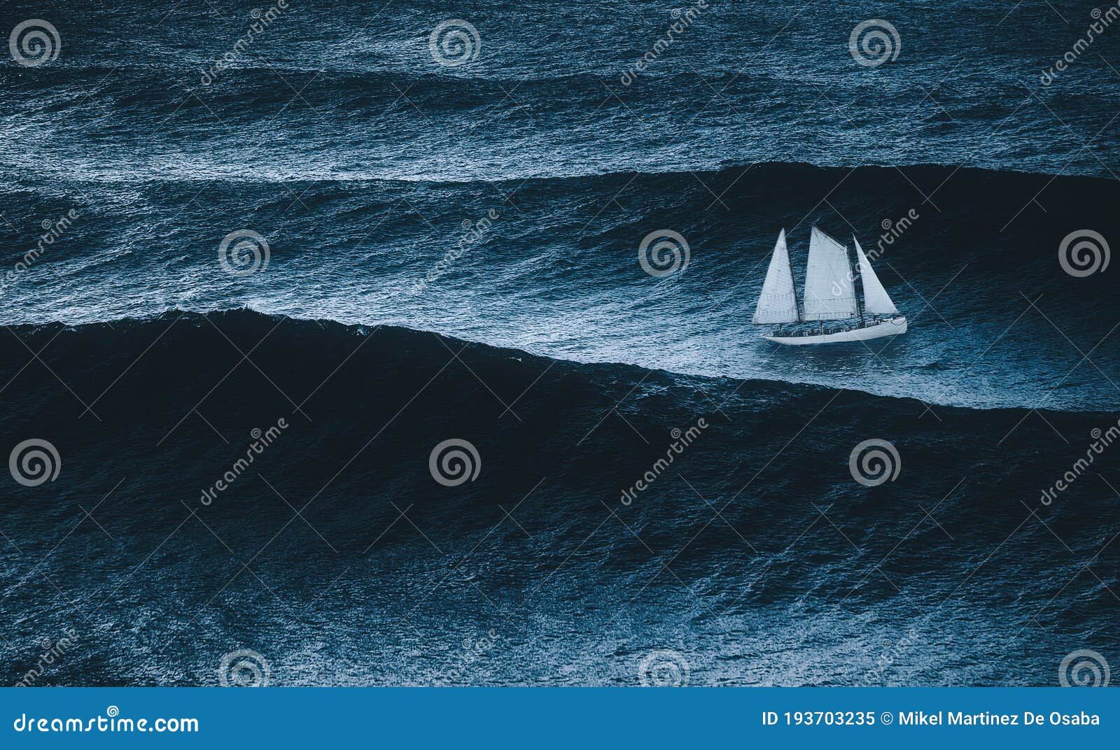 sailboat in big waves