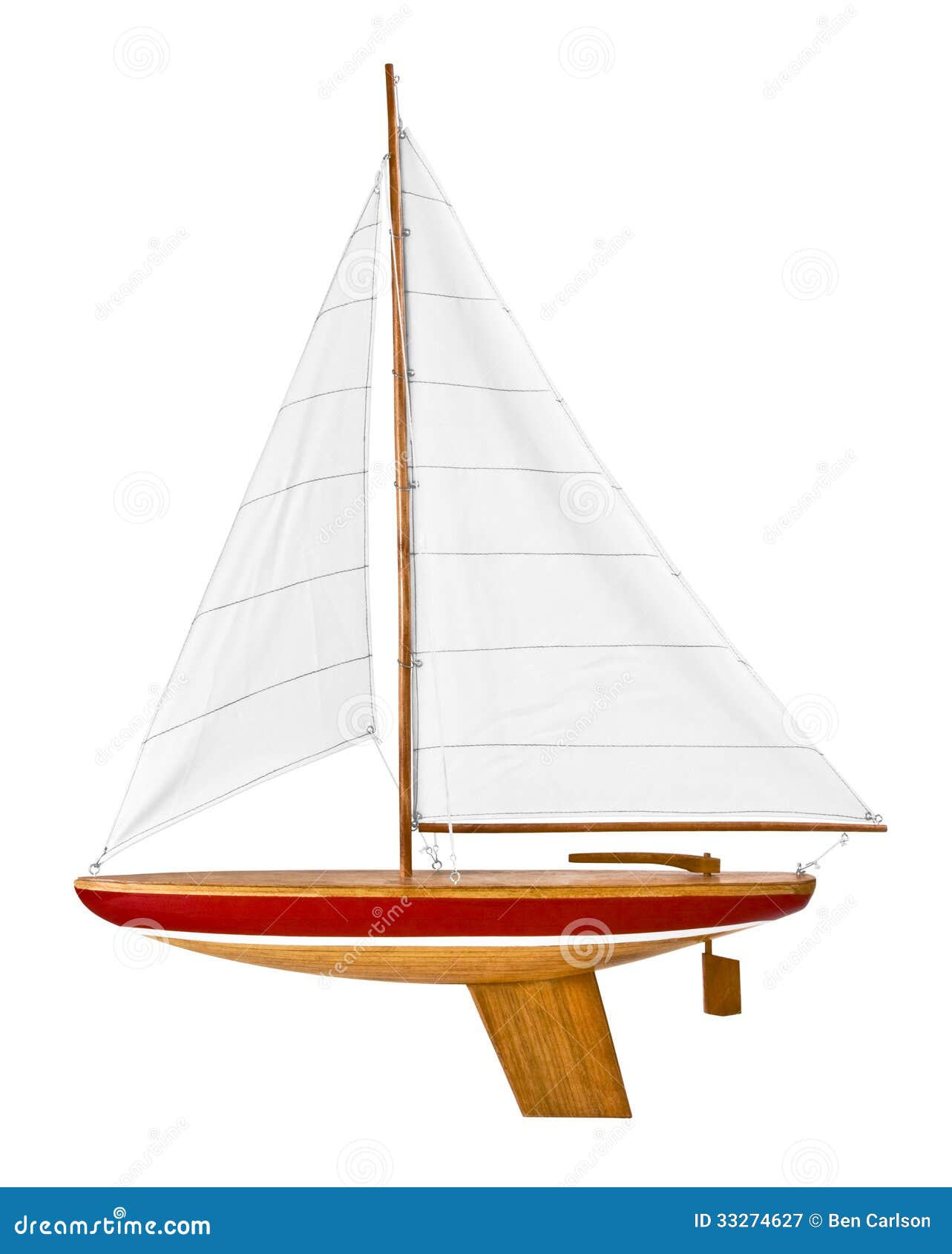 This is a wooden toy sailboat ready to put in the water and play. It 