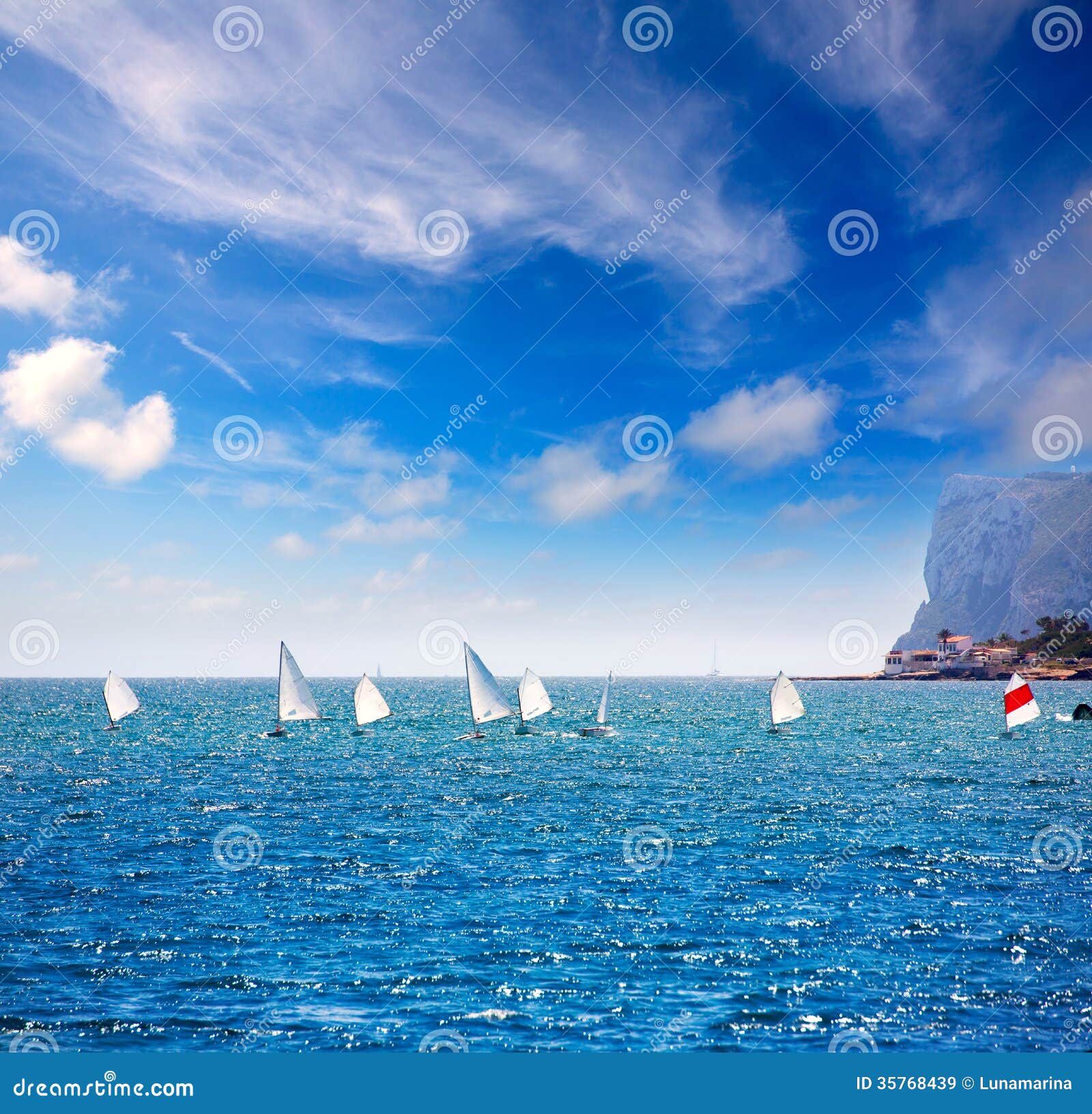 sailboats optimist learning to sail in mediterranean at denia