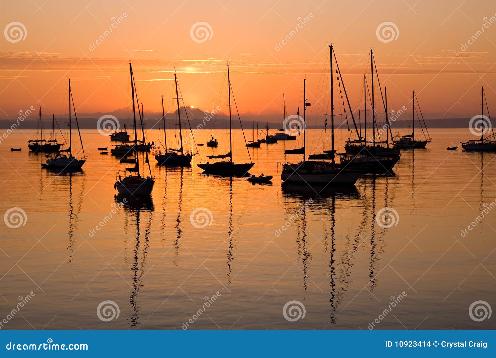 sailboats at sunrise in port townsend bay