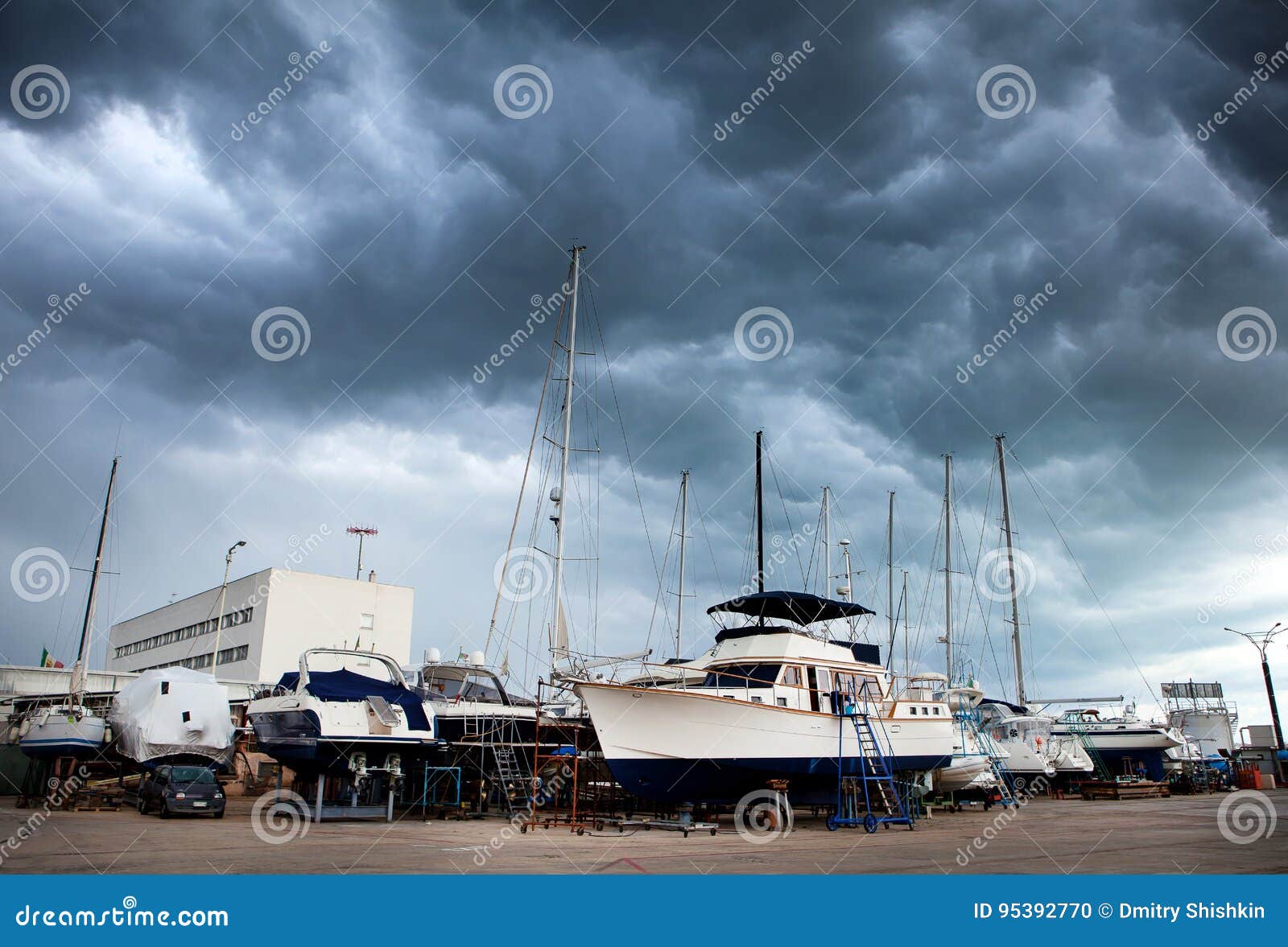 sailing boats and motor boats in the shipyard for repair and maintenance in the marina