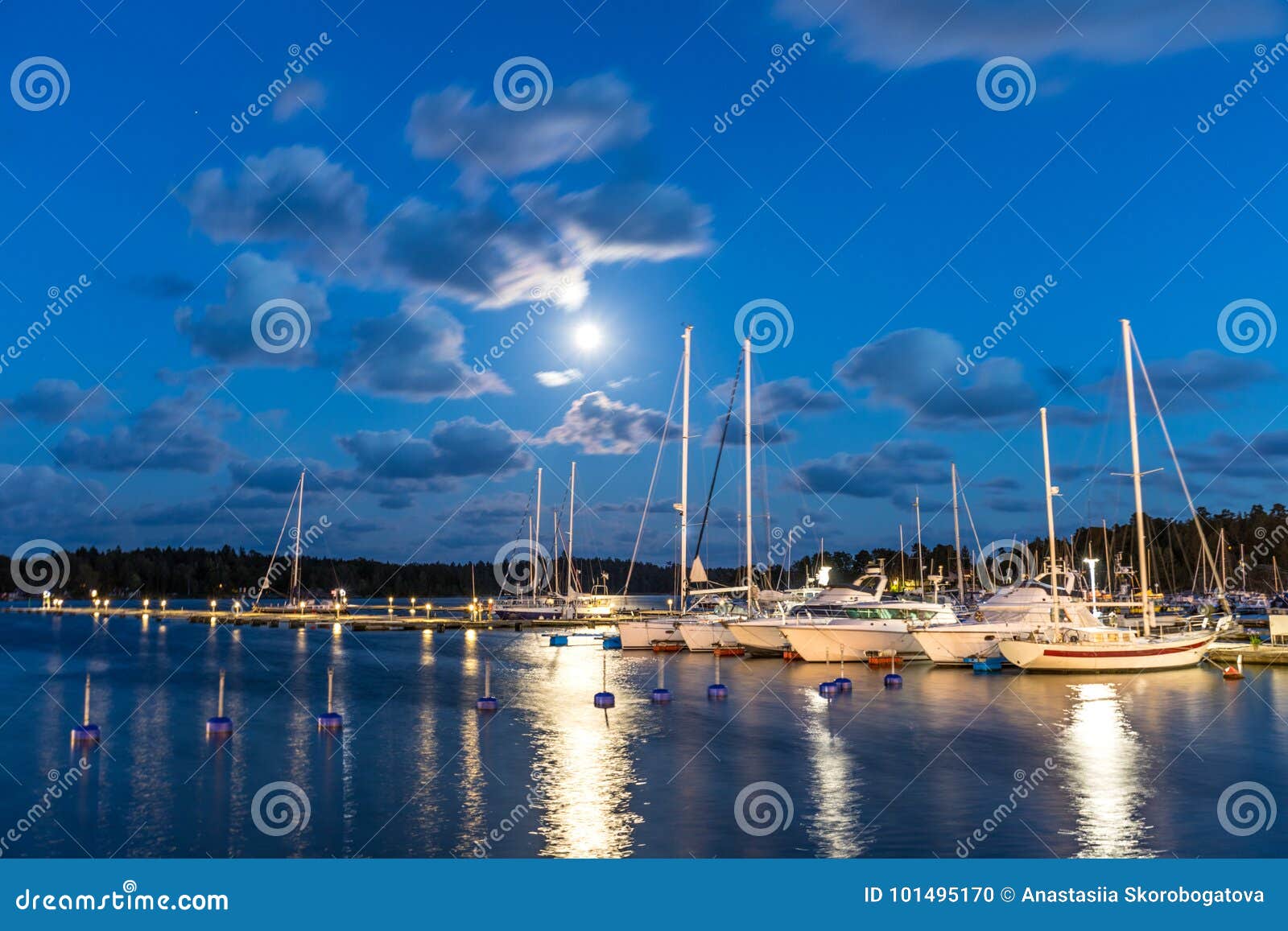 sailing boats and yachts in marina at night. nynashamn. sweden.