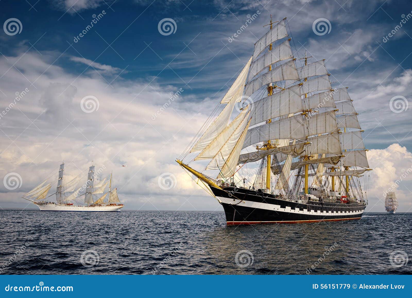 sailing ships on the background of a very beautiful sky. sailing. luxury yacht.