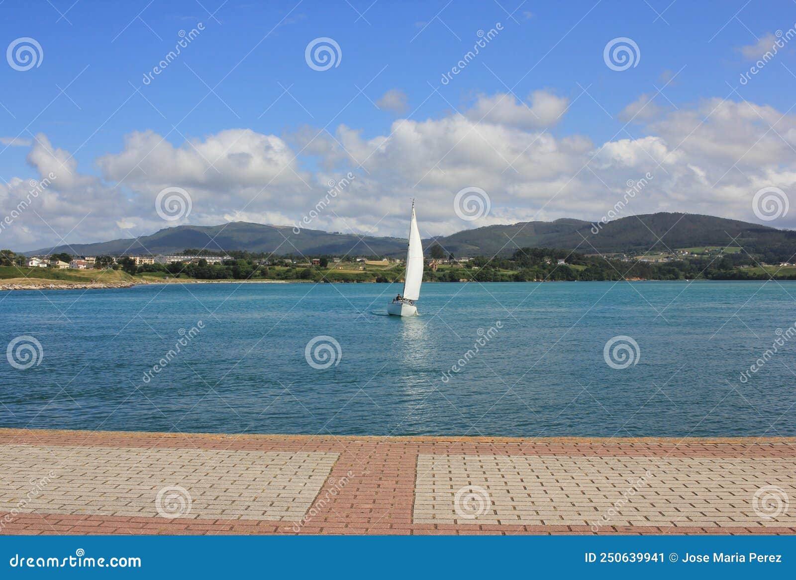 sailing yacht close to the coast