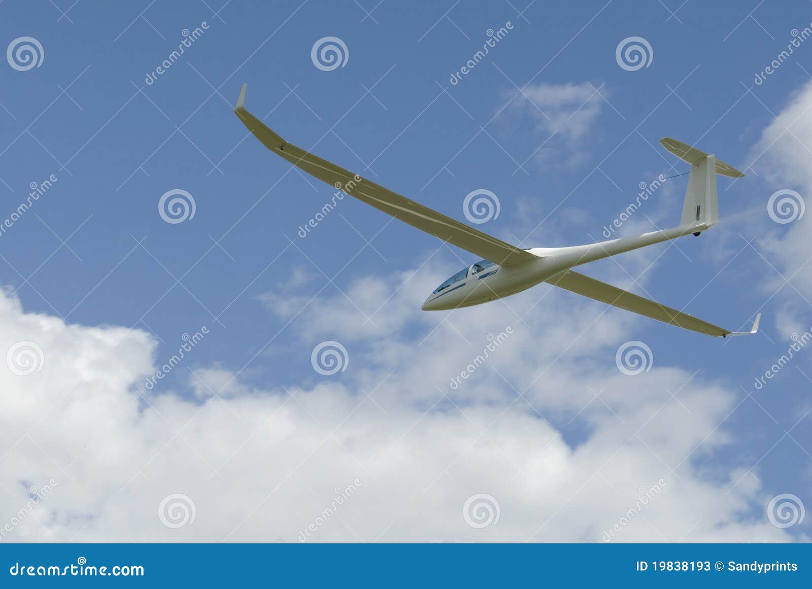 sailplane gliding through the sky.