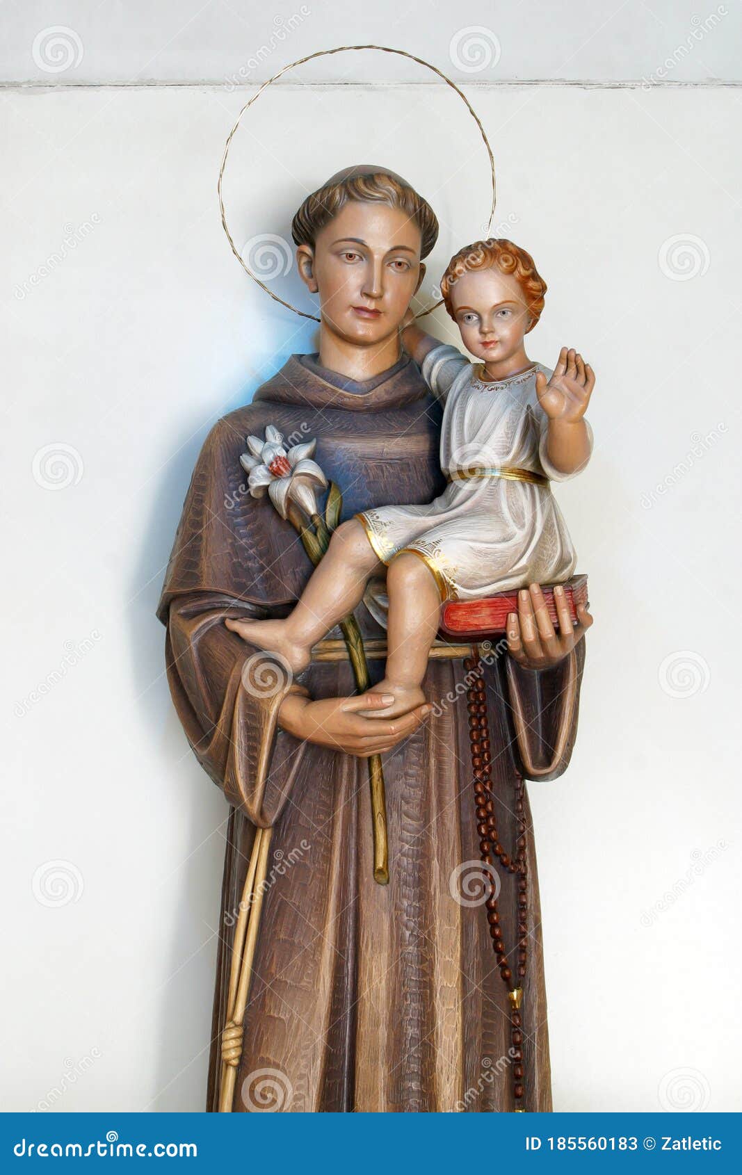 saint anthony holds a child of jesus, a statue in the church of saint anthony of padua in zagreb, croatia