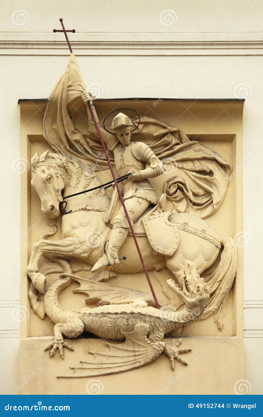 saint george killing dragon. stucco decoration on art nouveau bu