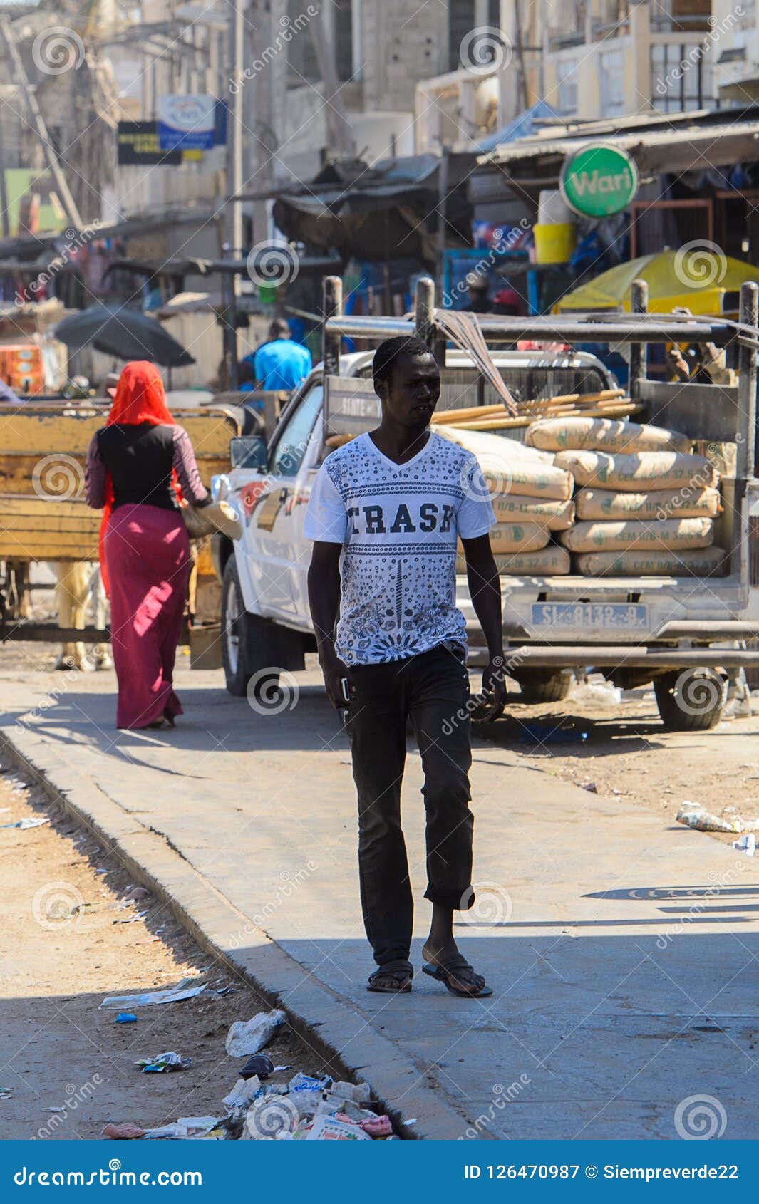 Unidentified Senegalese Man Walks Along The Road At The Local M Editorial Photography - Image of ...