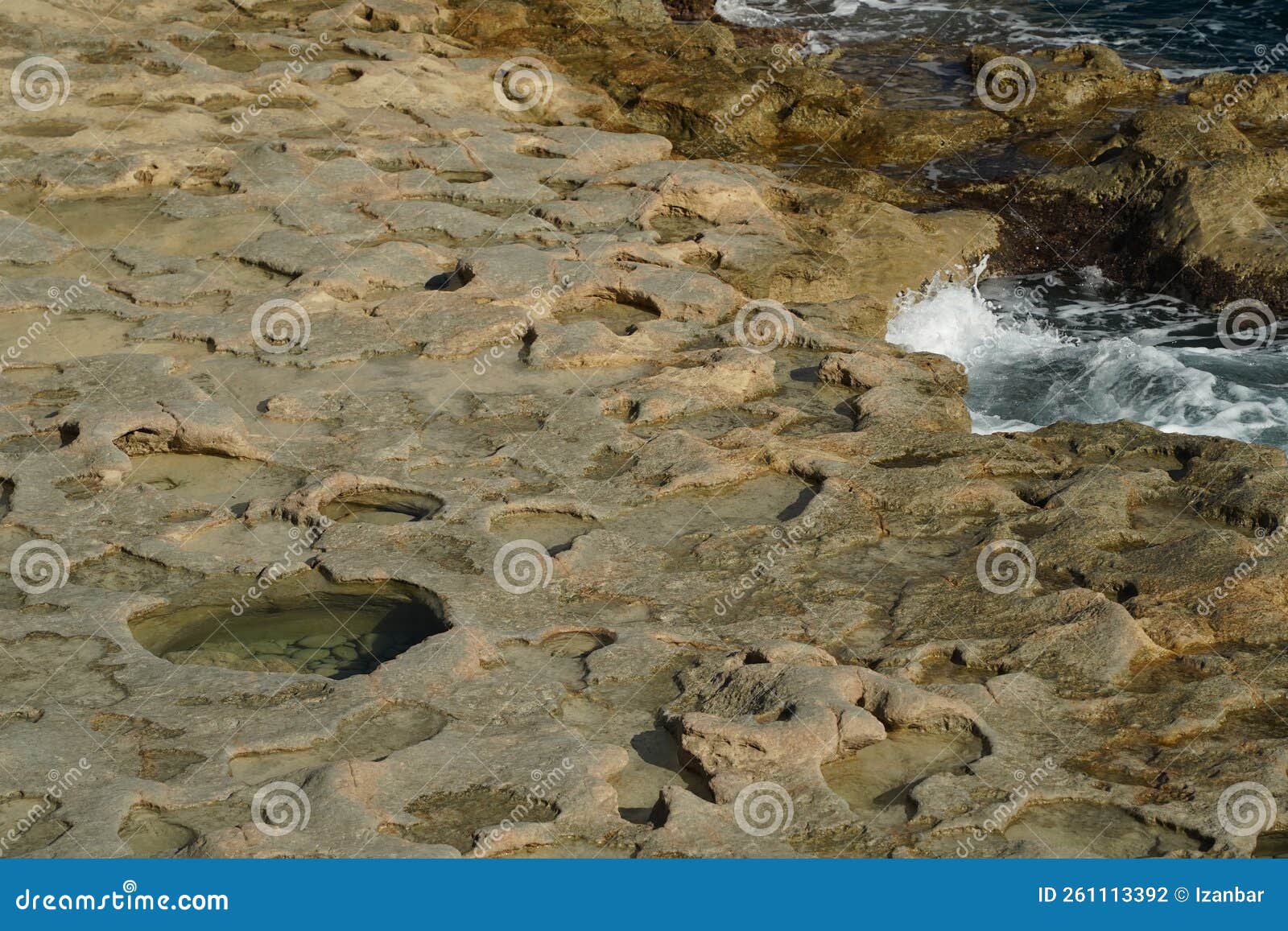 Saint Peter Pools Malta Rock Formation Hole on Rocks Stock Photo