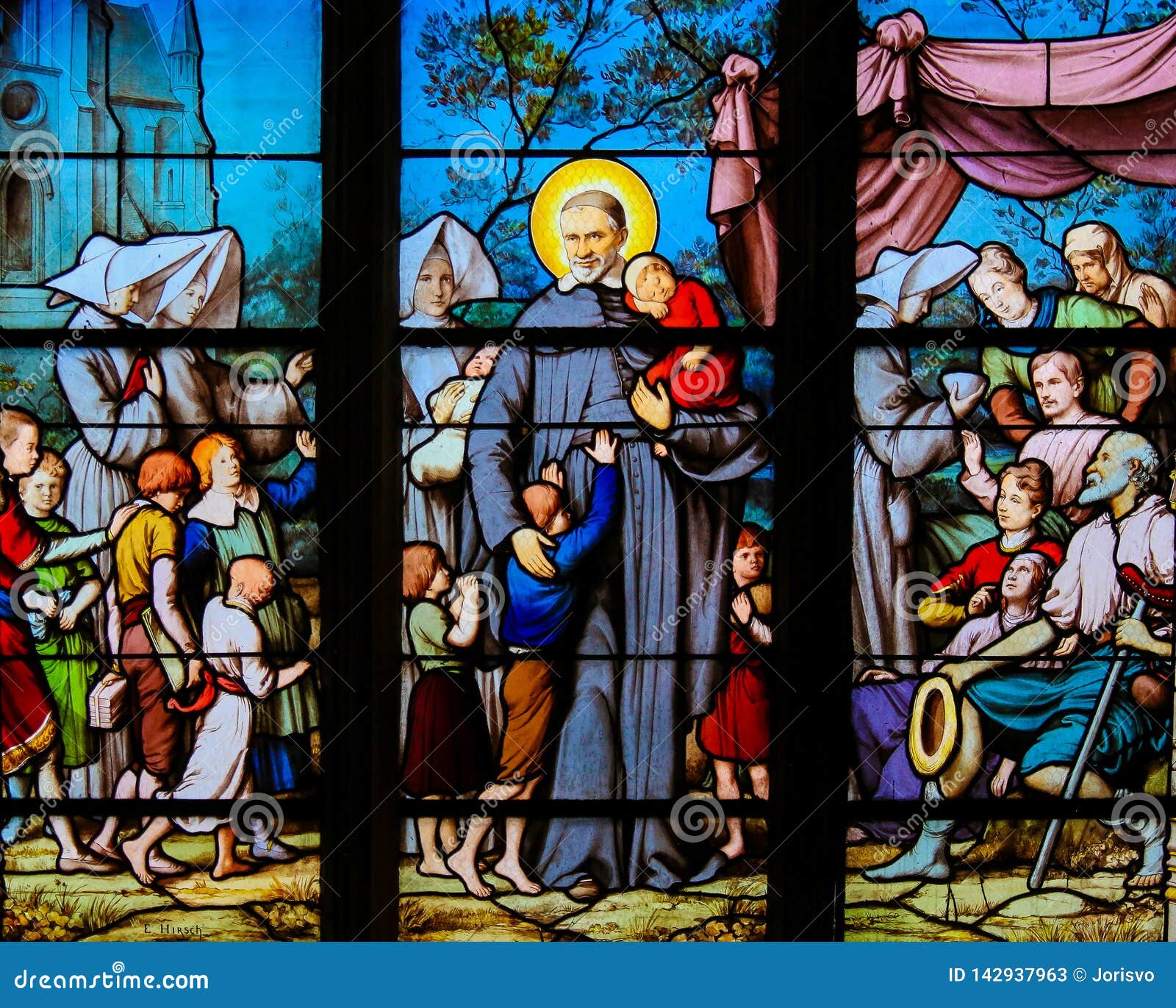 saint vincent de paul on a stained glass in paris
