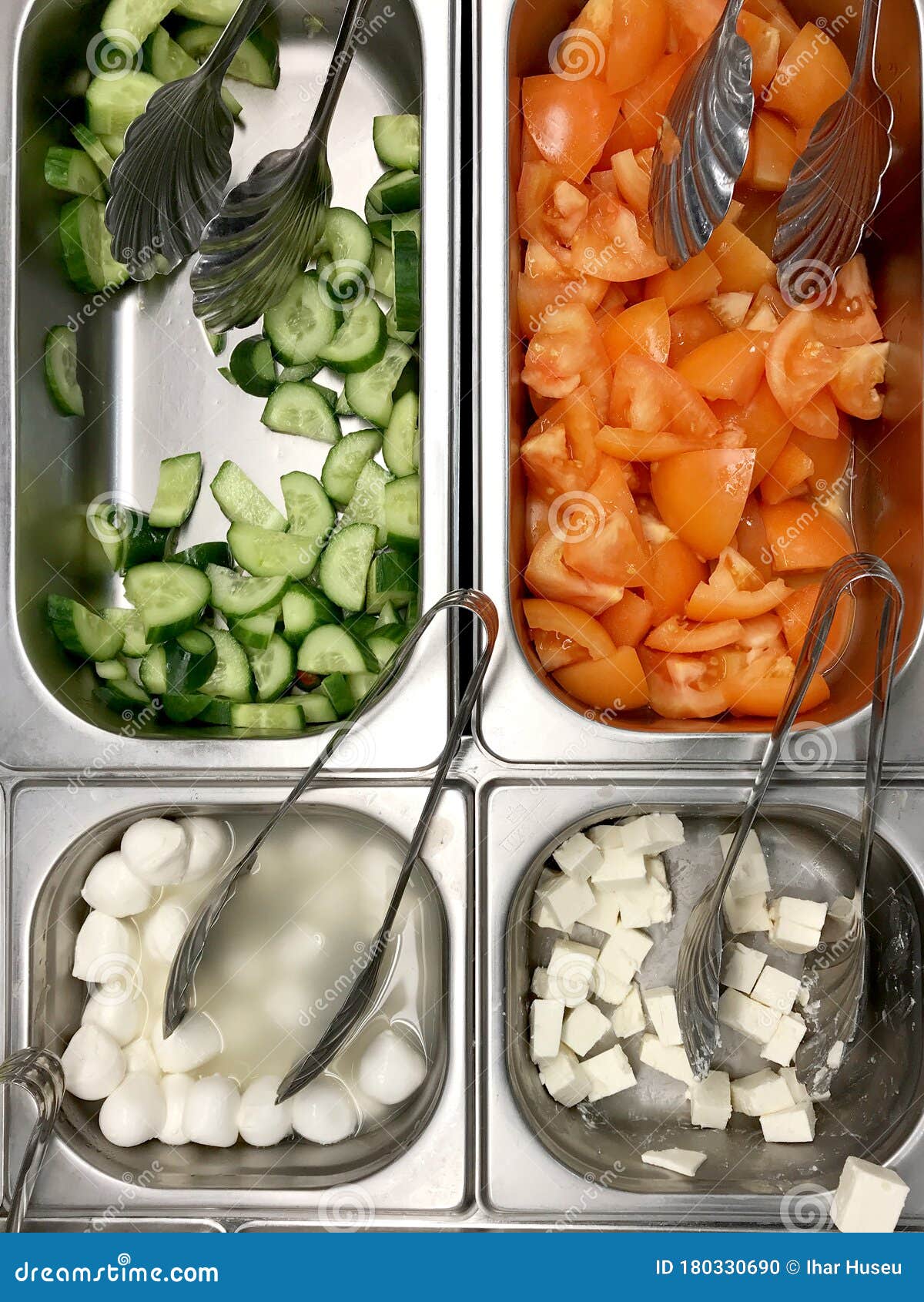 Salad Bar with Various Vegetables and Different Types of Cheese Stock
