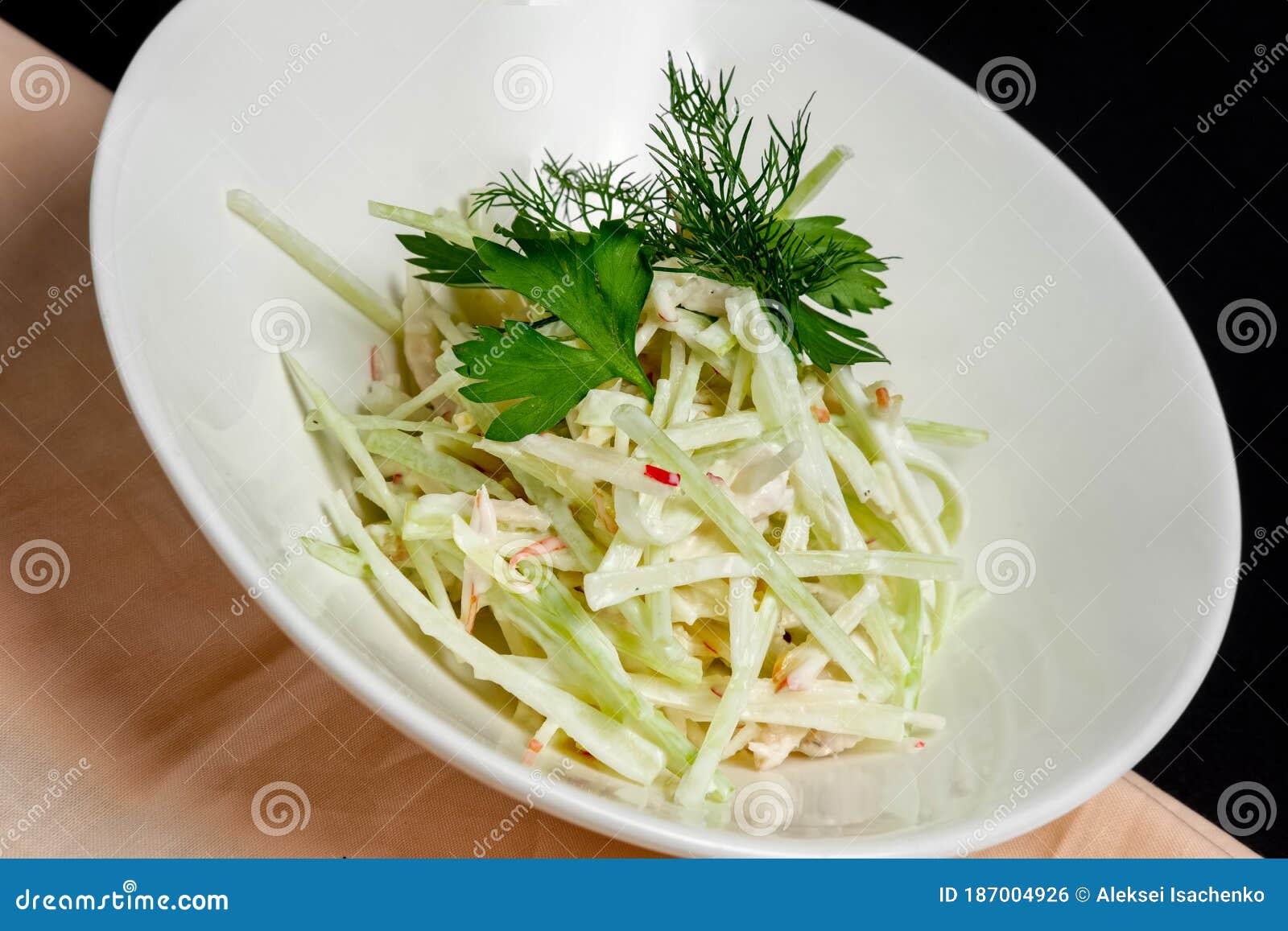 Salad with Crab, Cucumber and Cabbage Cutted in Straws Stock Photo