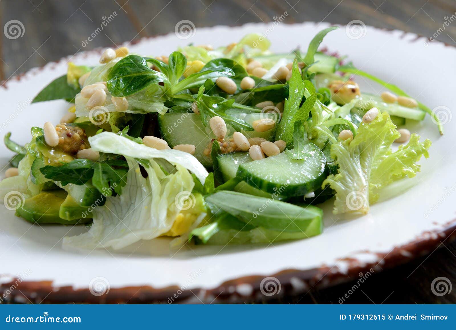 Cucumber salad with pine nuts and mustard dressing