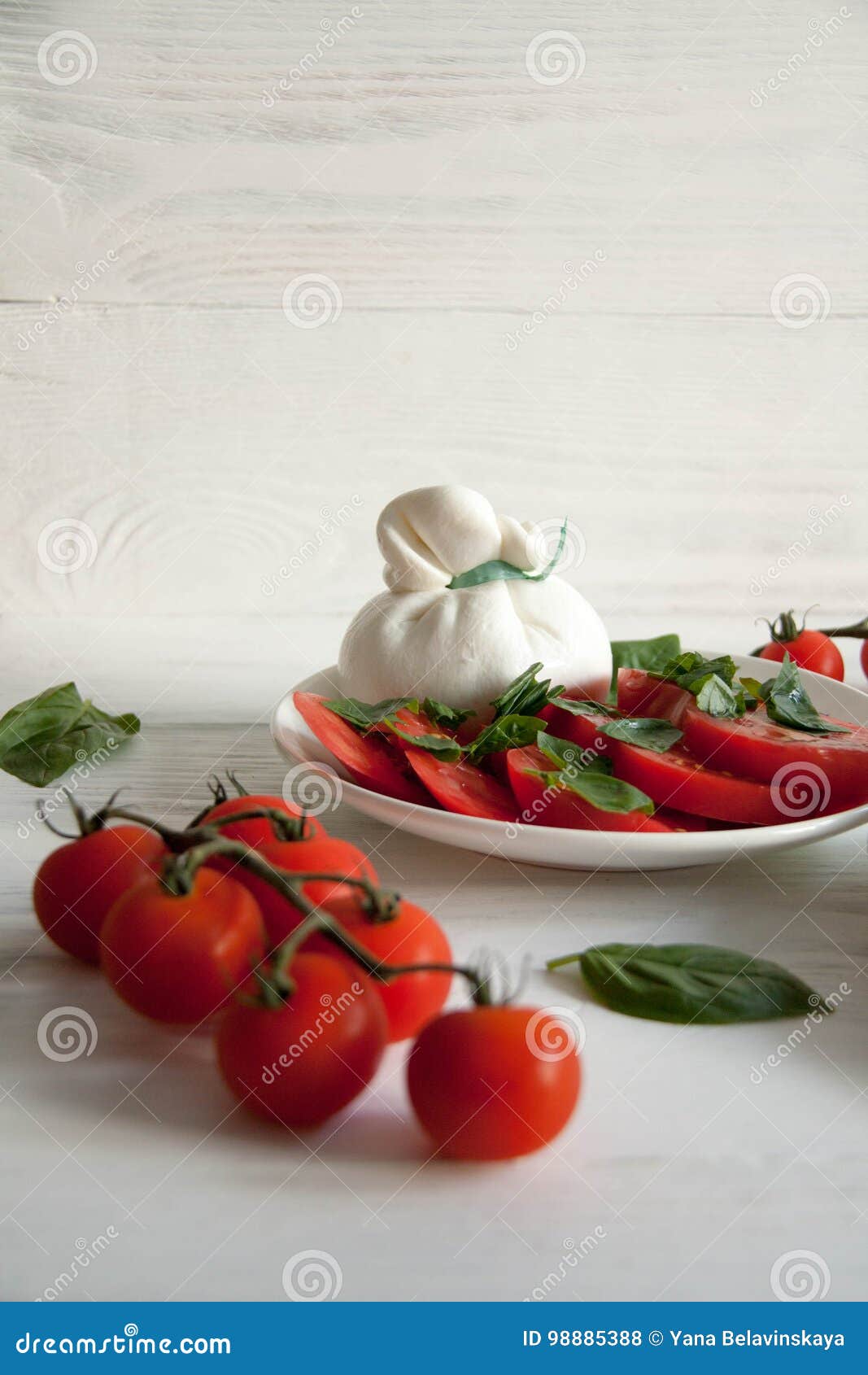 salad with fresh tomato, cheese and basil