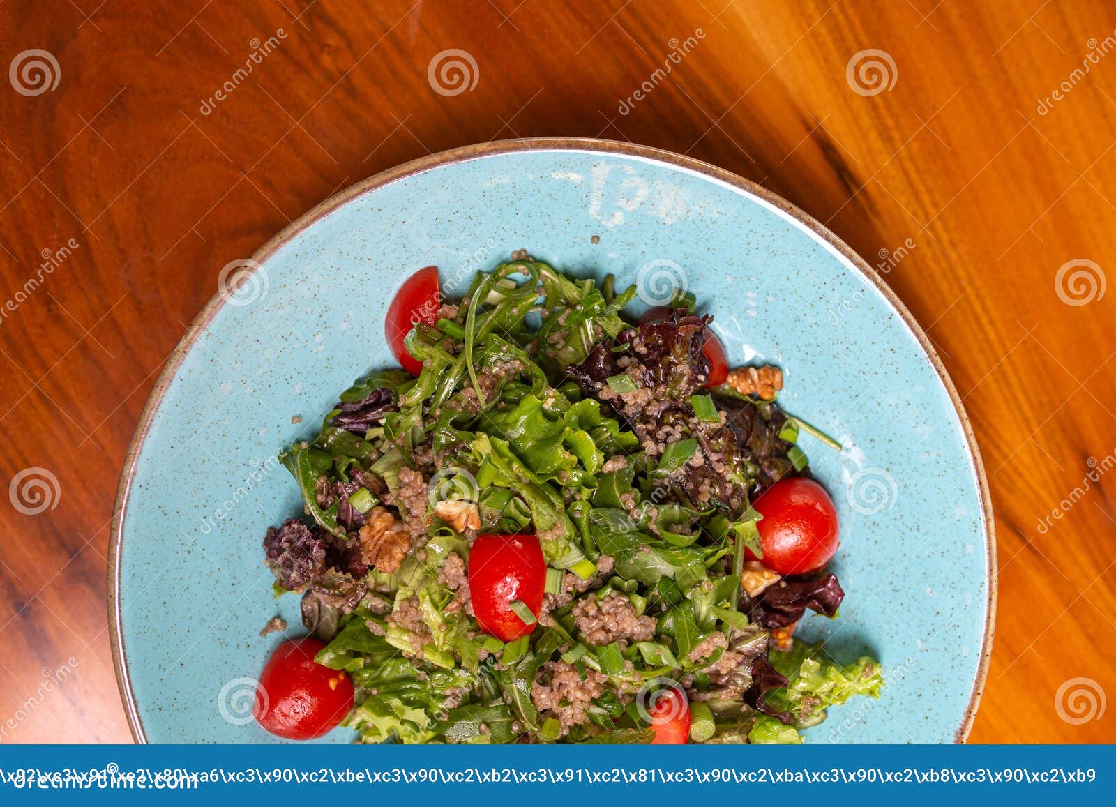 Salad with Tomatoes , Lettuce and Seafood on the Restaurant Table Stock