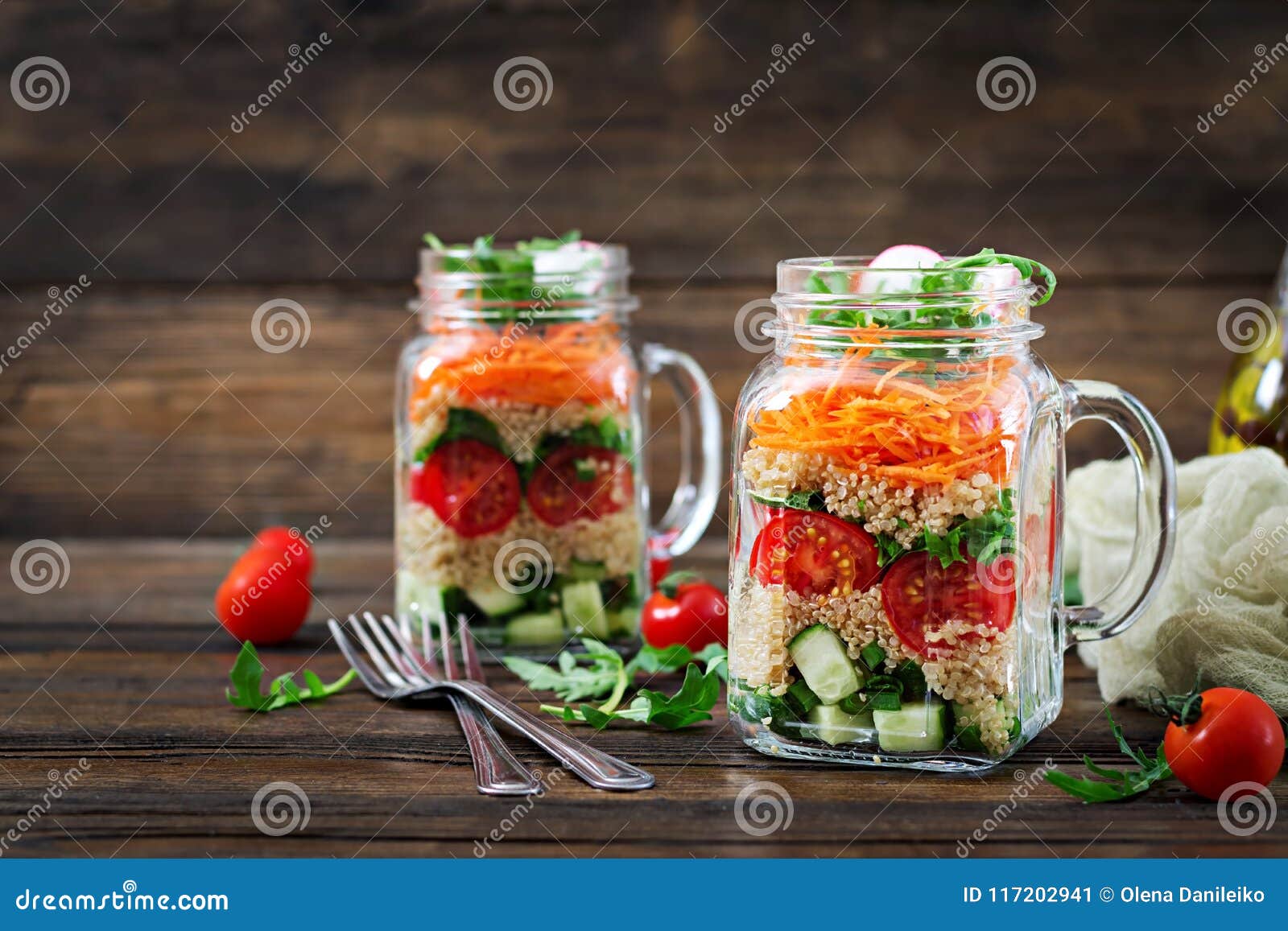 salads with quinoa, arugula, radish, tomatoes and cucumber