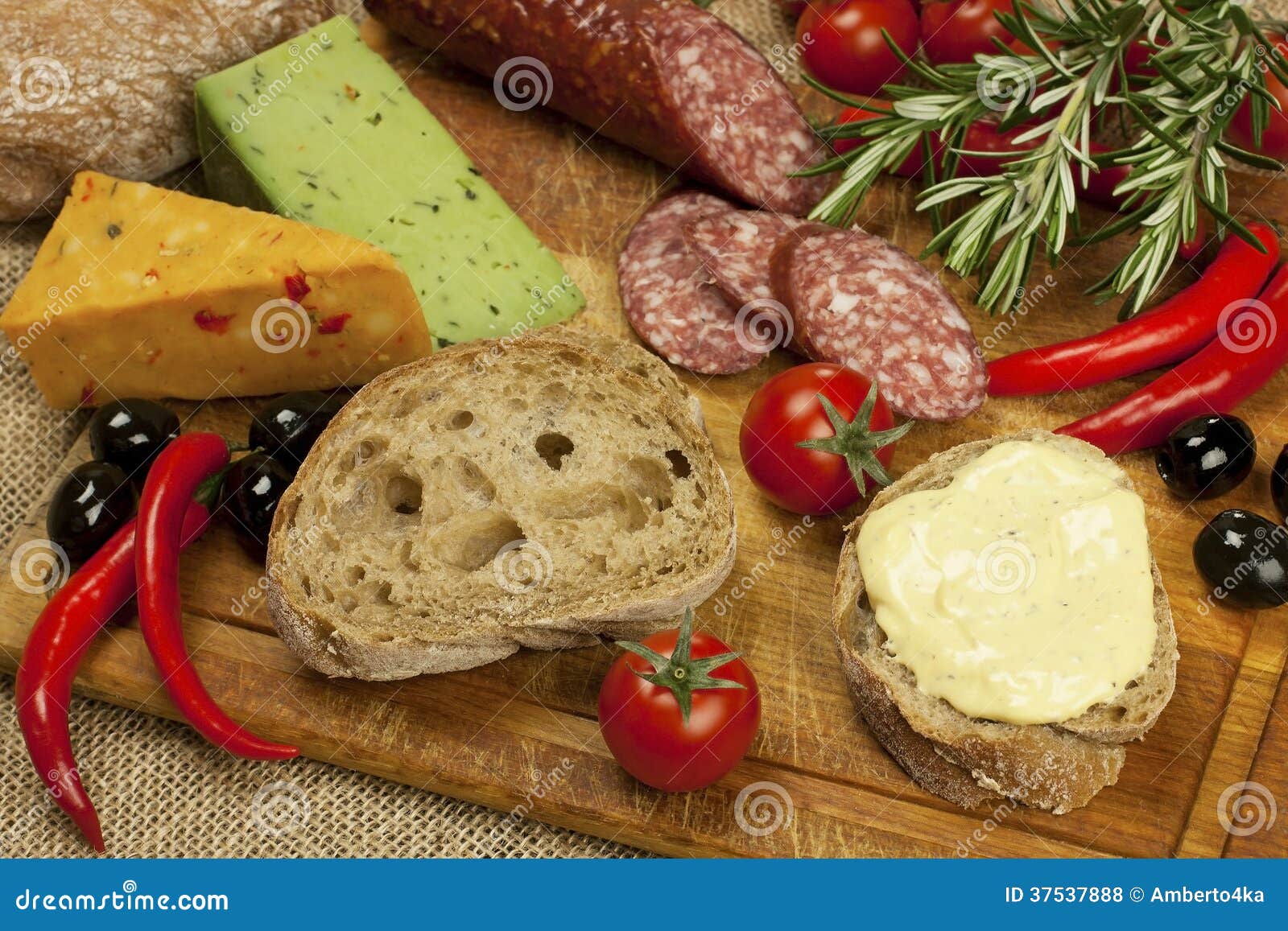 Salami and Cheese Platter with Vegetable and Herbs Stock Photo Image