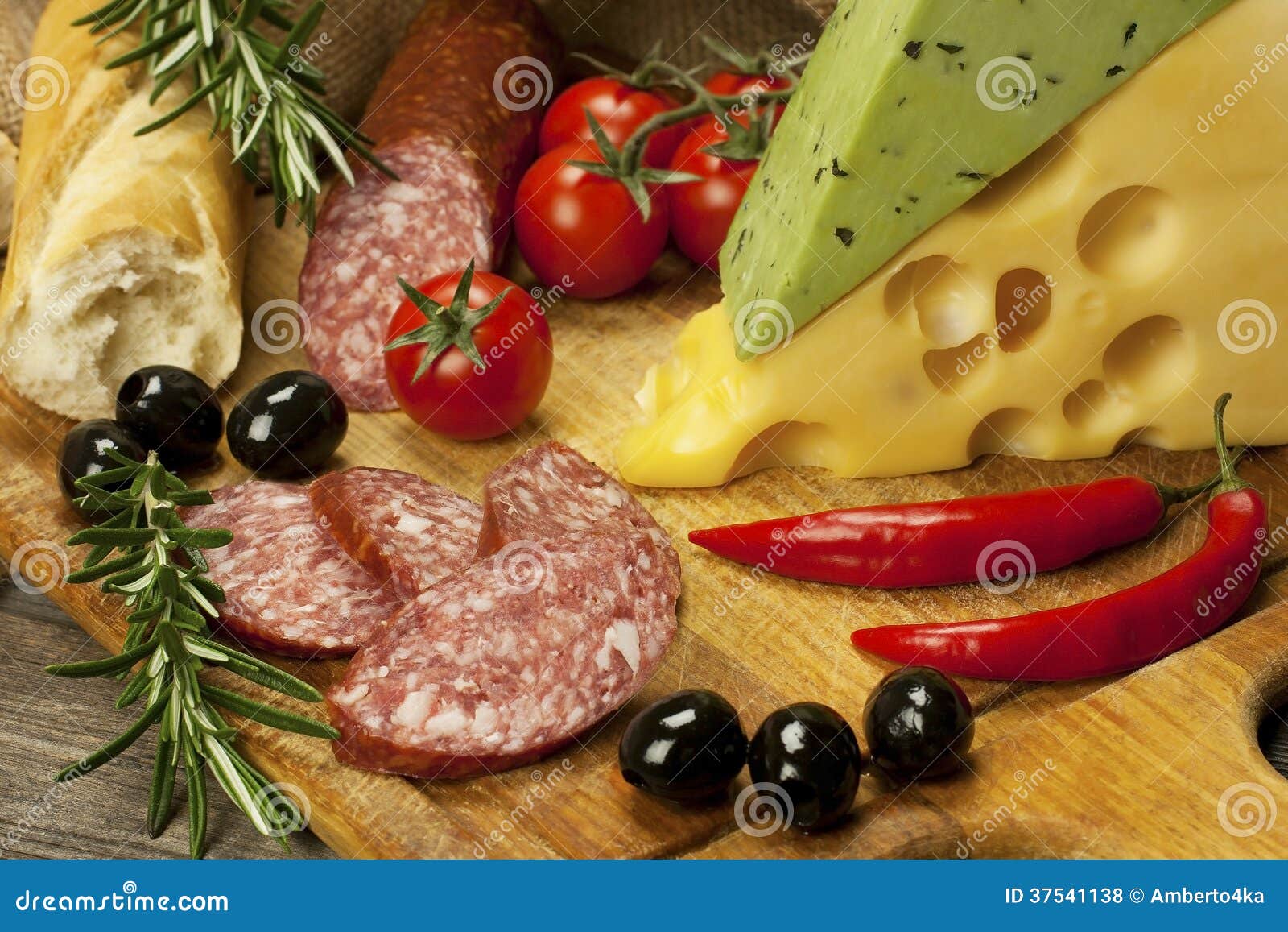 Salami and Cheese Platter with Vegetable and Herbs Stock Photo Image