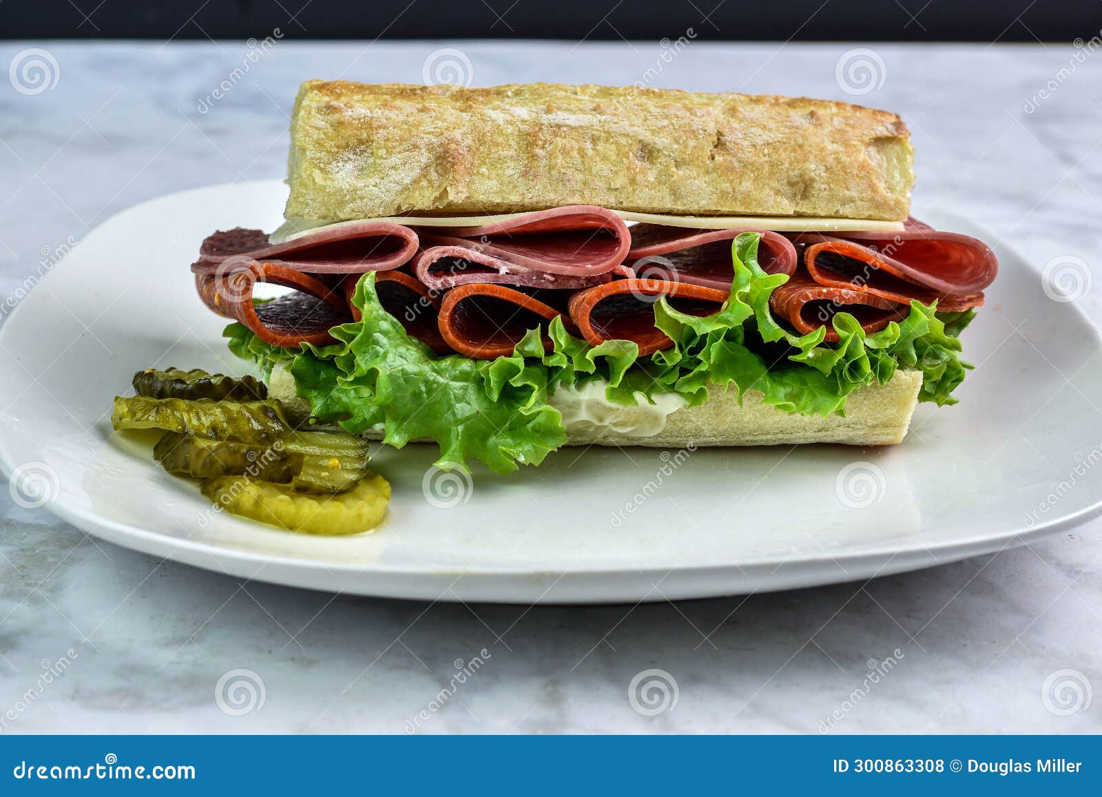 Salami and Pepperoni on Ciabatta Bread with Pickles Stock Photo - Image ...