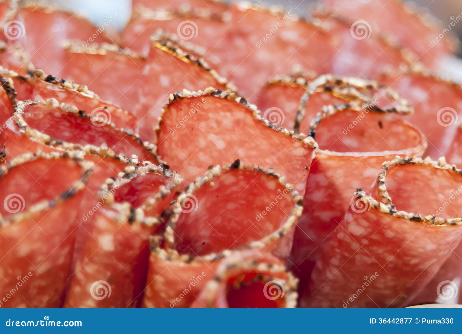 Salami slices stock image. Image of delicatessen, cold 36442877