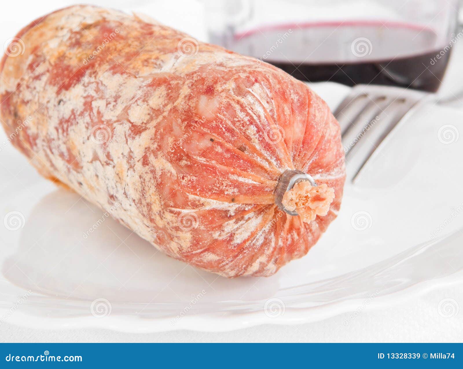 Salami on white dish. stock image. Image of culinary 13328339