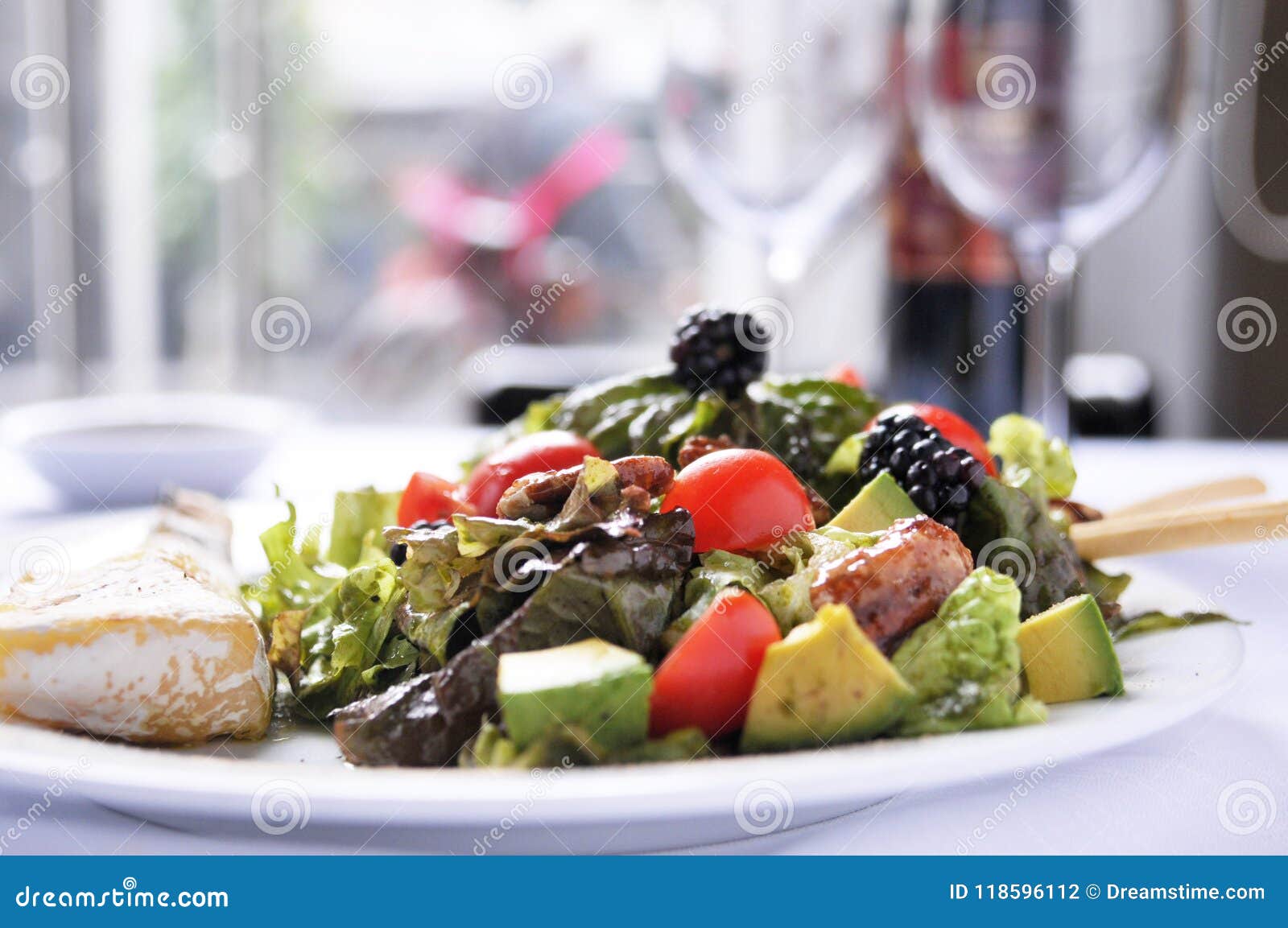 a sald with vegetables and fruit fresh and healthy food
