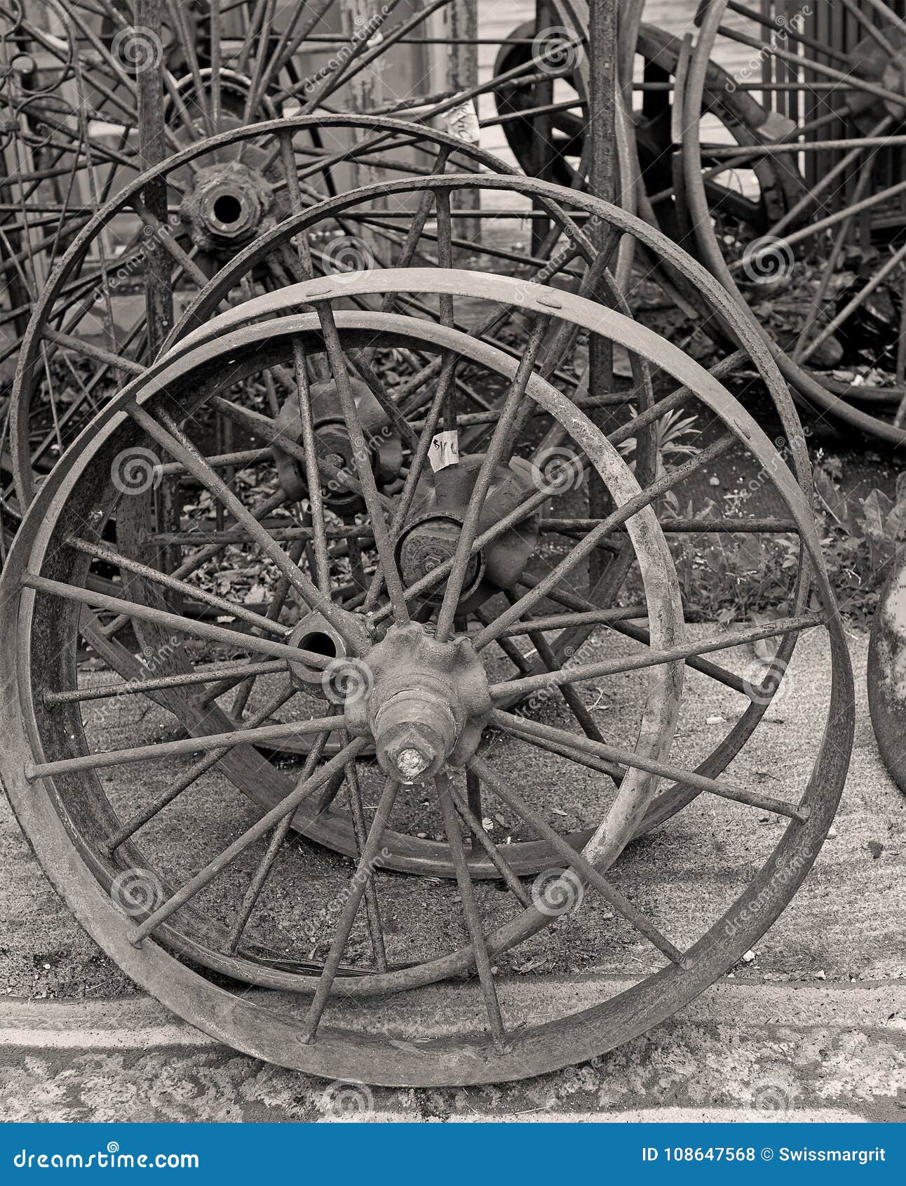 Old Metal Wagon Wheel for Sale at the Antique Market Stock Photo