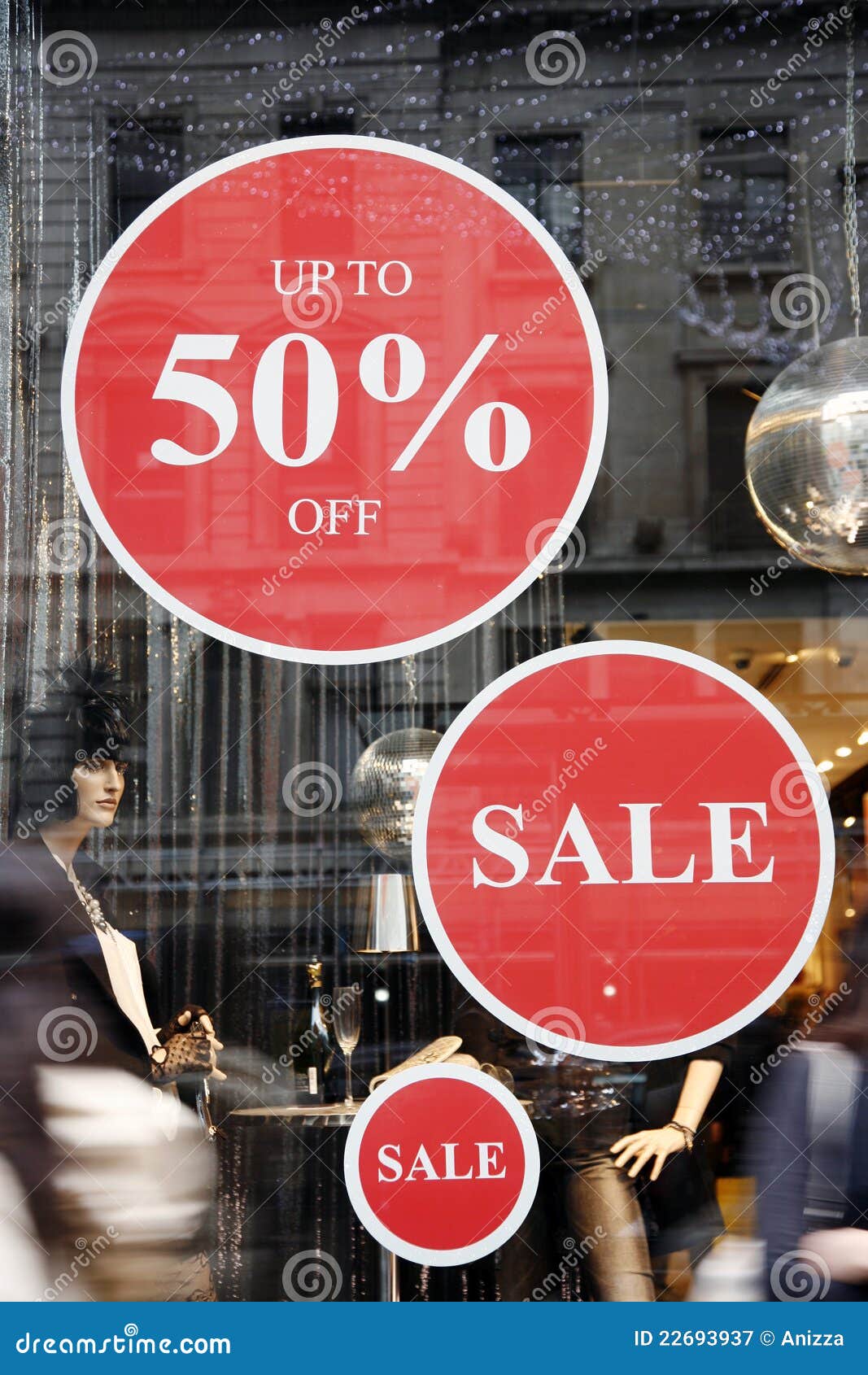 Sale Signs In Shop Window Royalty Free Stock Photography - Image: 22693937