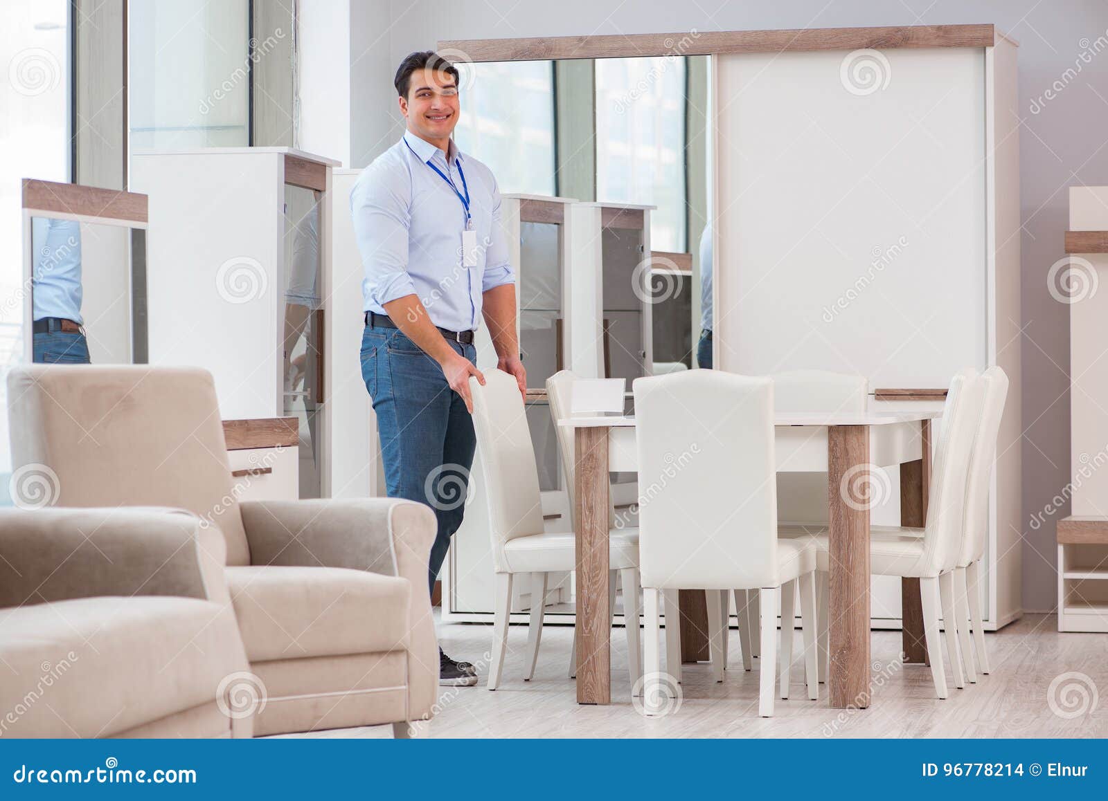 The Sales Assistant in Furniture Store Stock Photo Image of credit