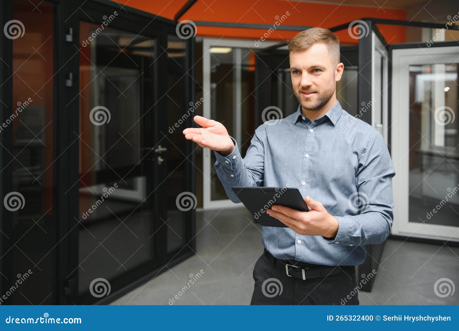 Sales Manager in a Window Shop. the Concept of Window Sales. Stock