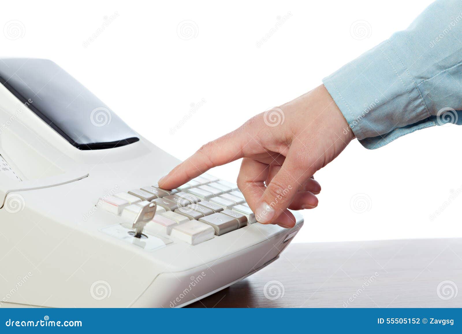 sales person entering amount on cash register in retail store