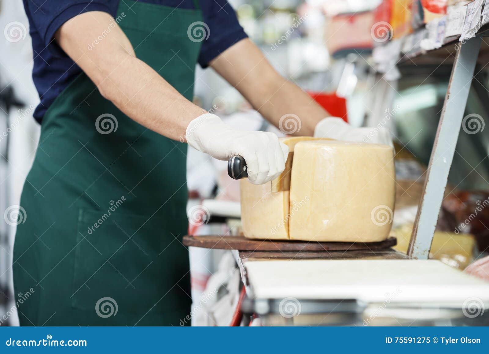 Salesman Slicing Cheese with Double Handled Knife Stock Image Image