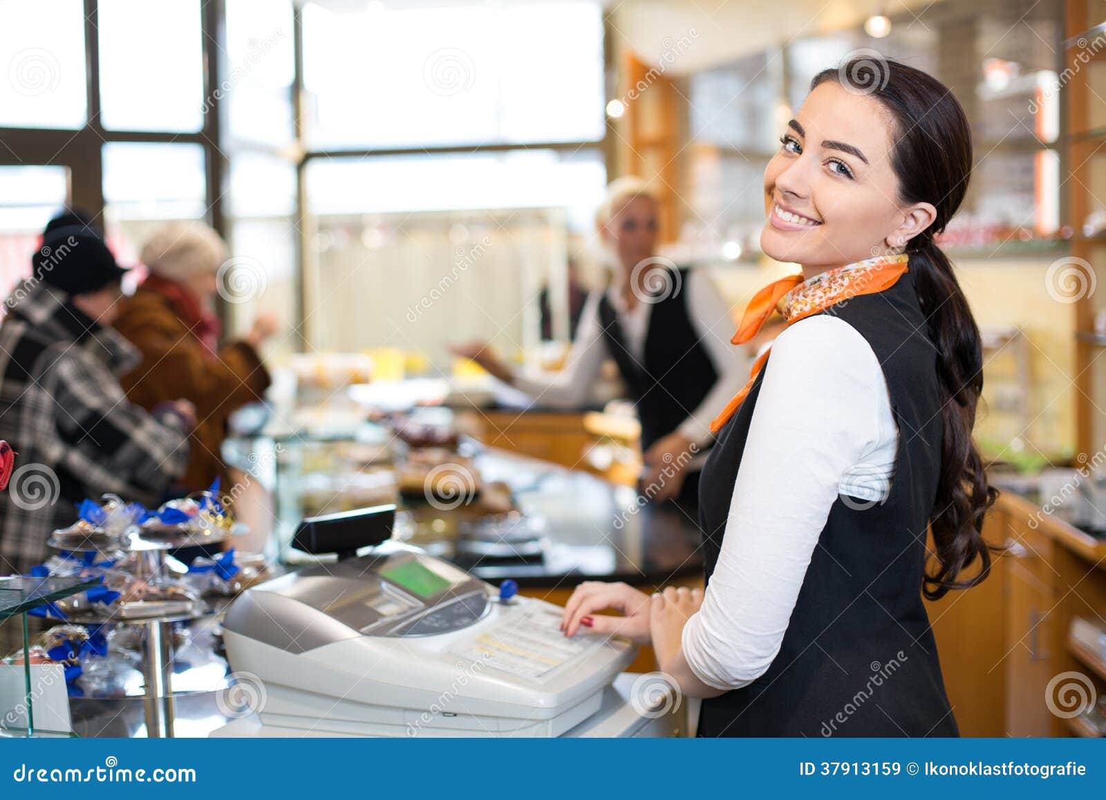 salesperson at cash register