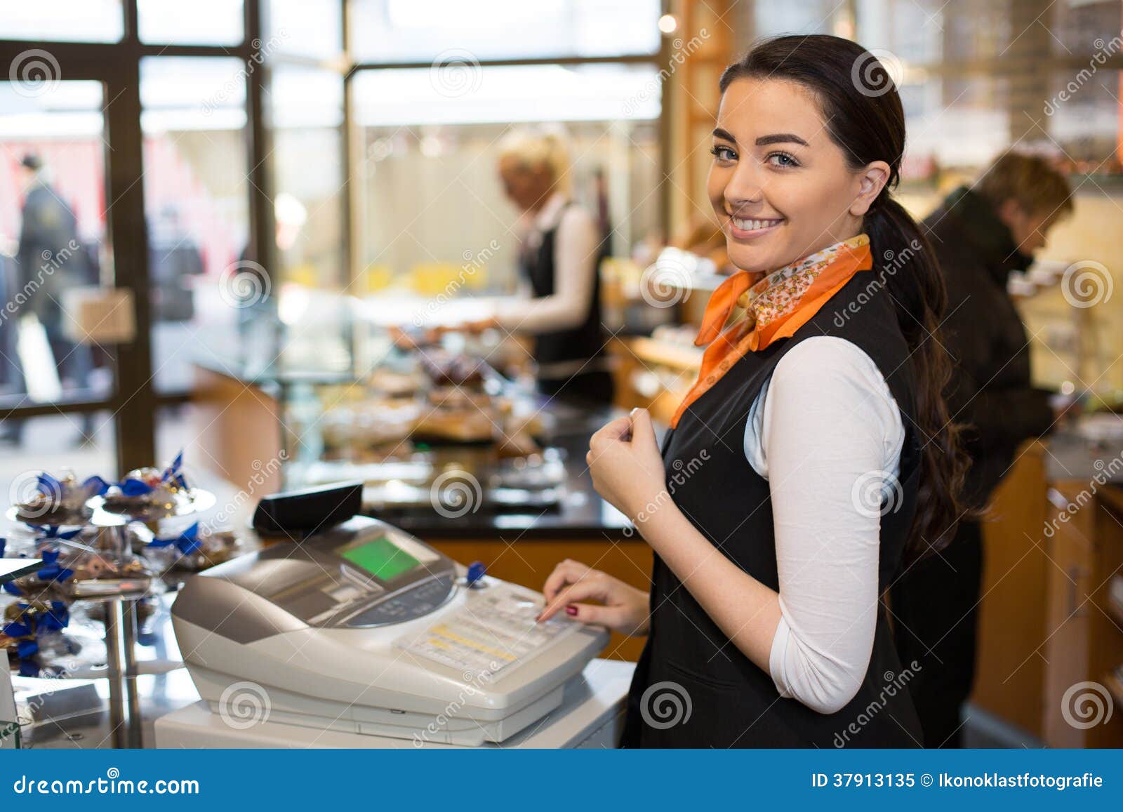 salesperson at cash register